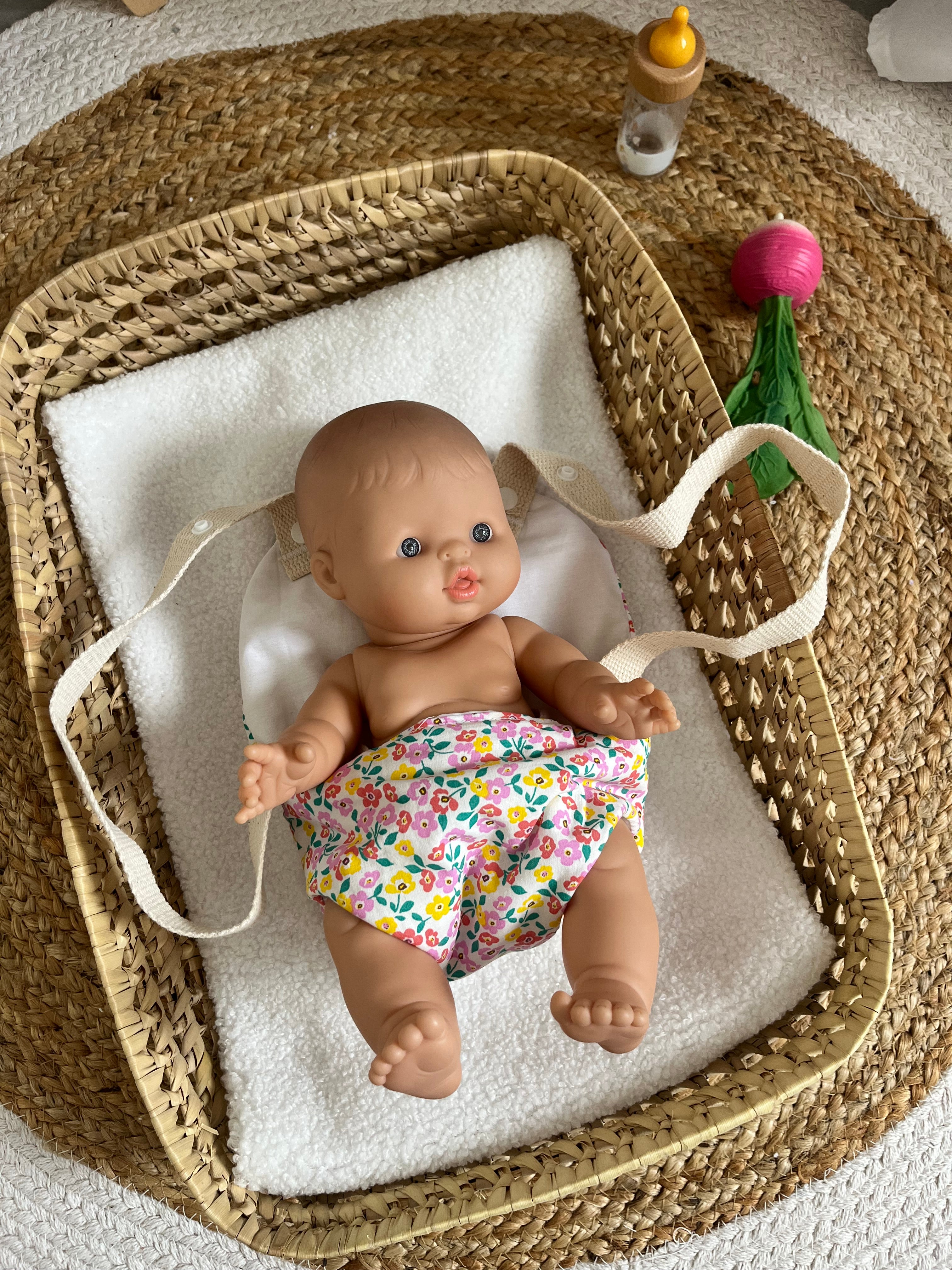 Porte bébé /poupée fleur