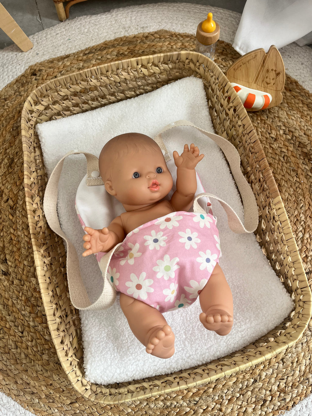 Porte bébé /poupée fleur