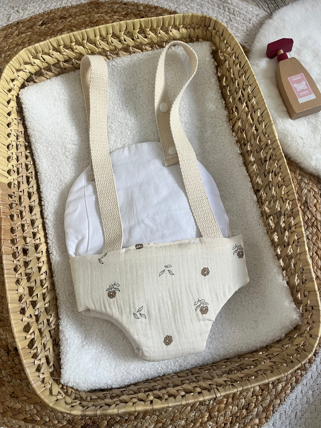 Porte bébé /poupée fleur