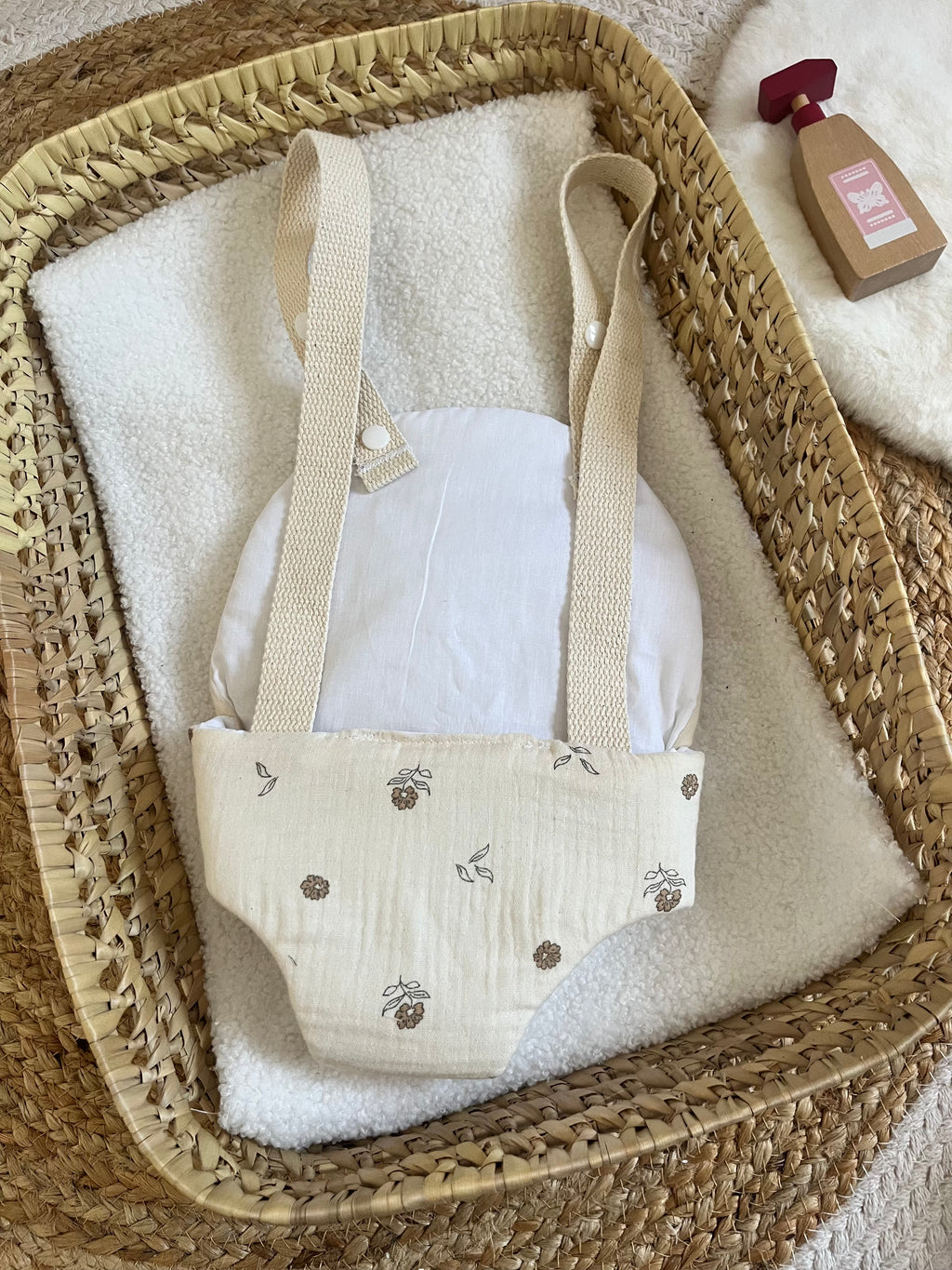 Porte bébé /poupée fleur