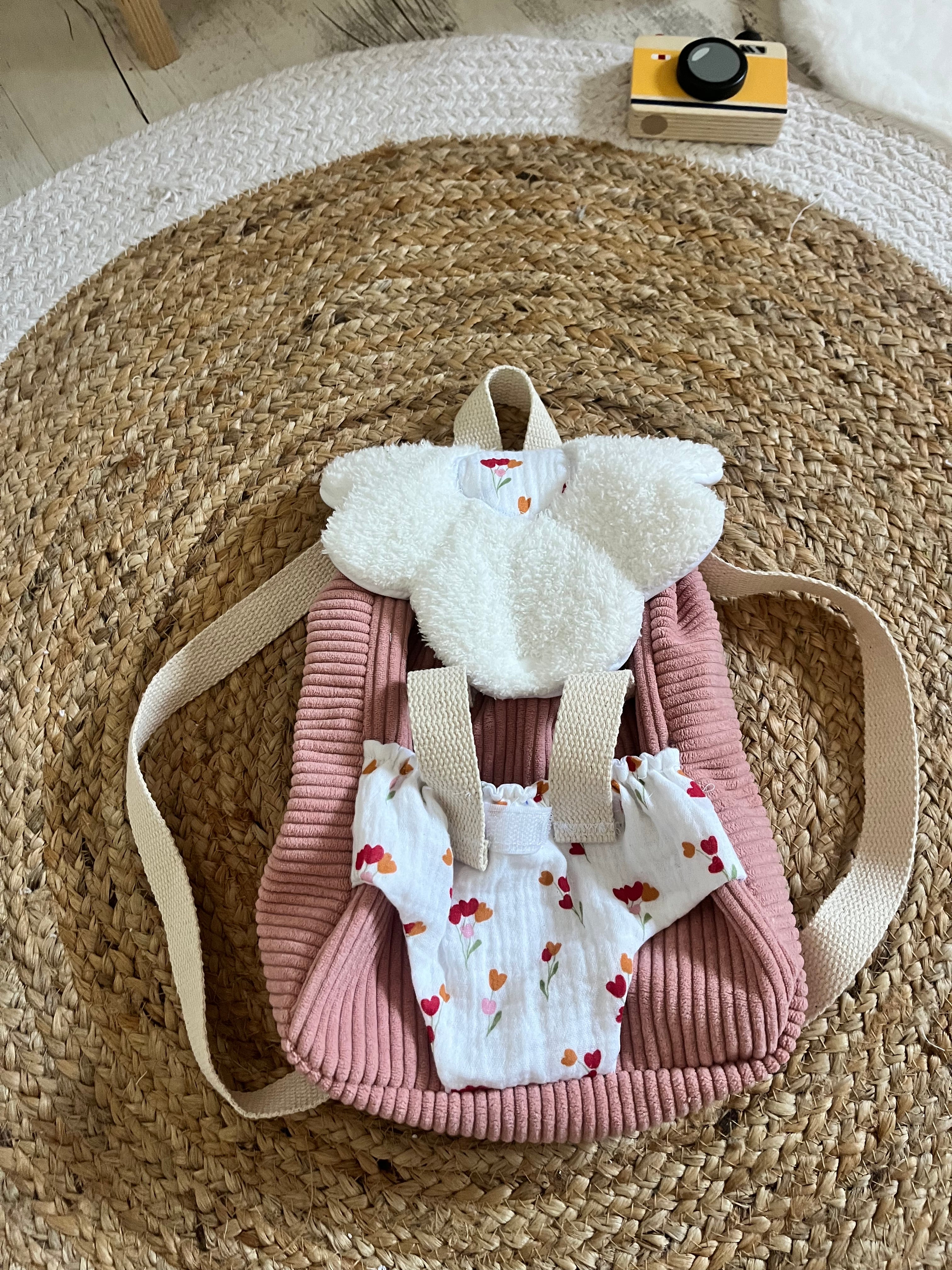 Sac à dos / porte poupée fleur