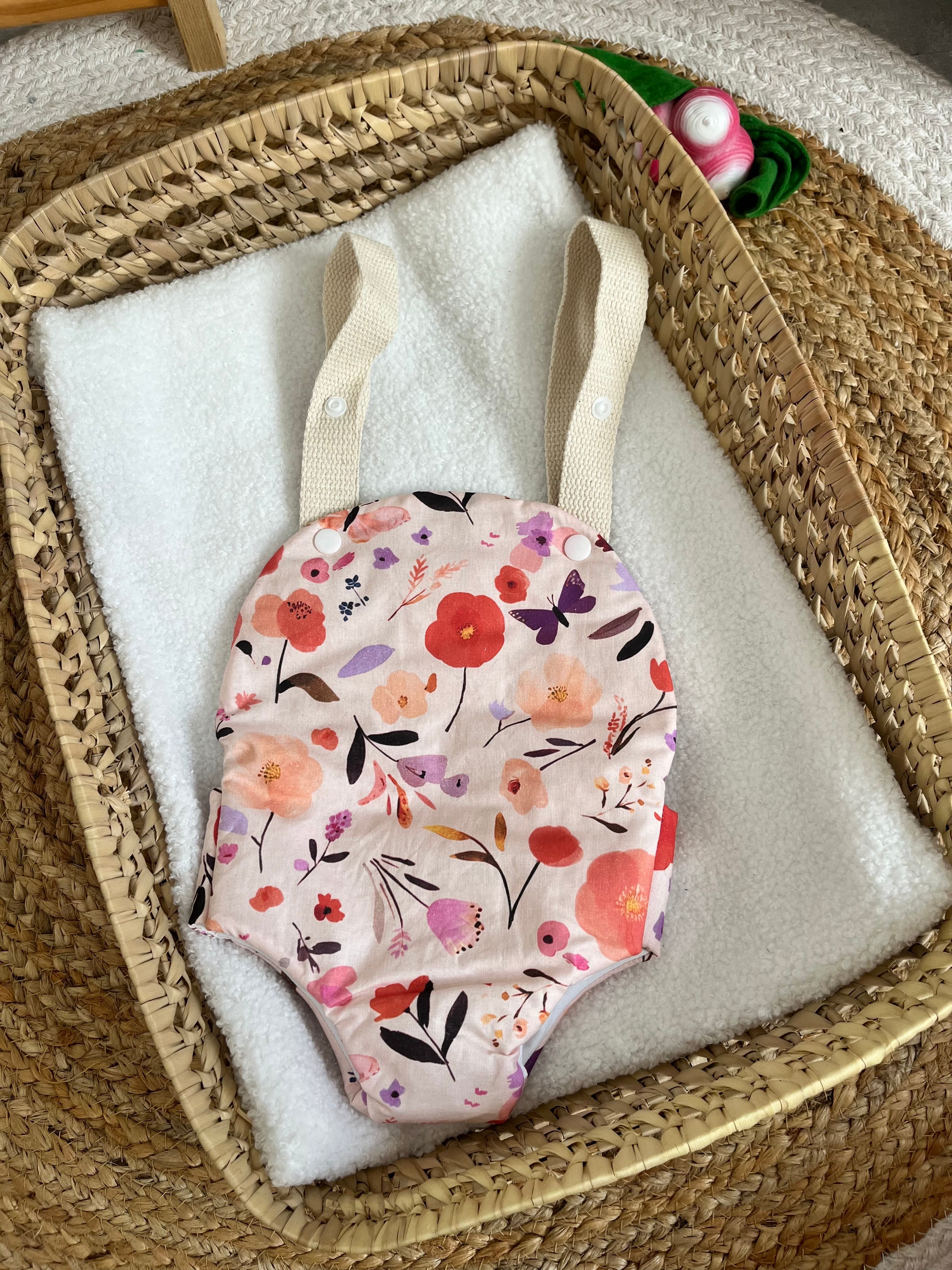 Porte bébé /poupée fleur