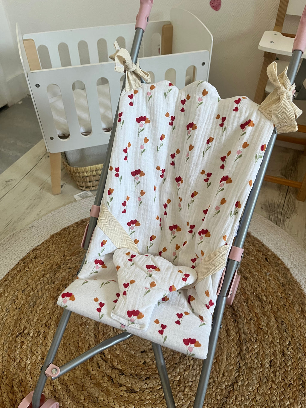 Housse poussette fleuri