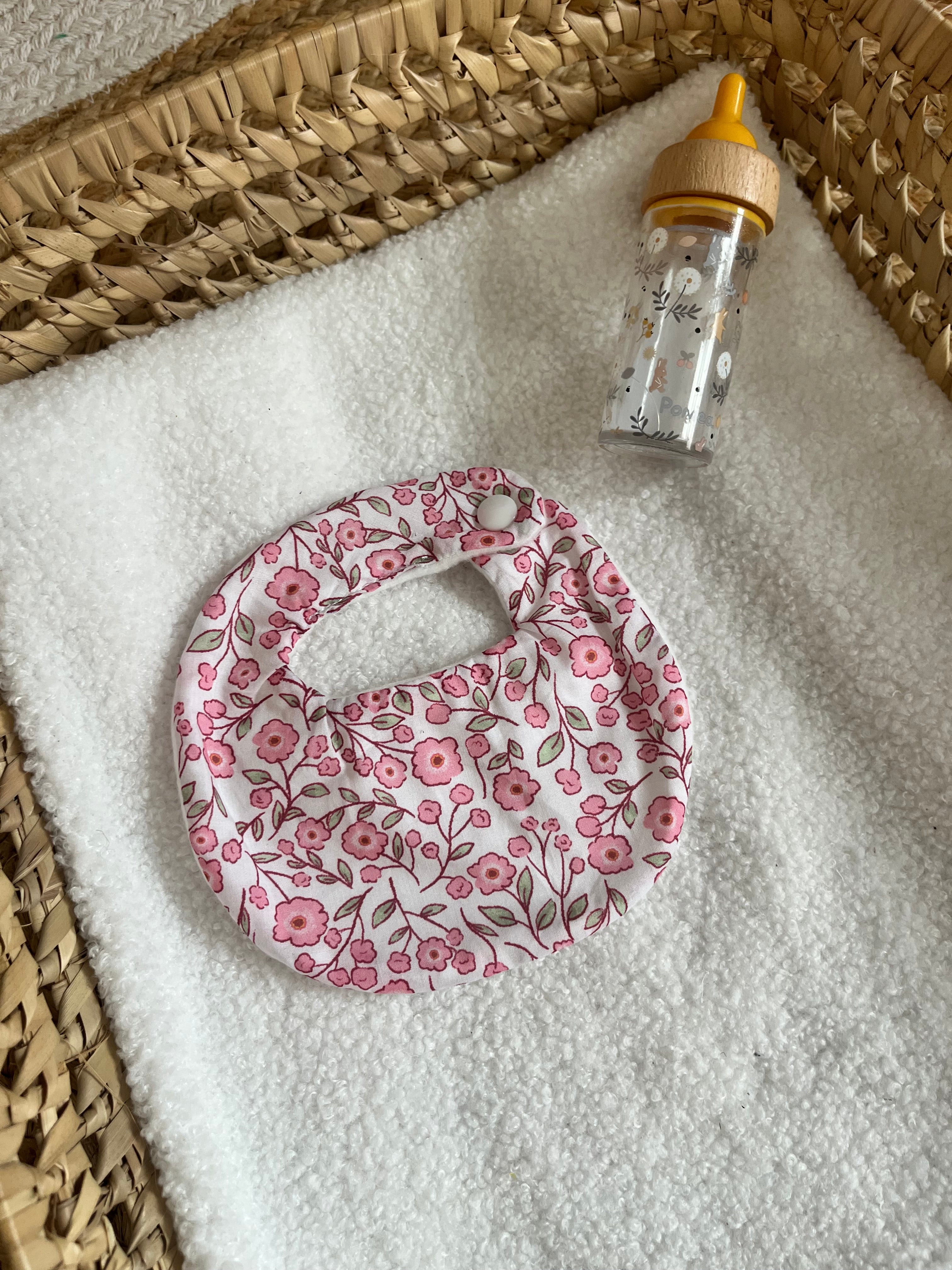Bavoir poupée rose