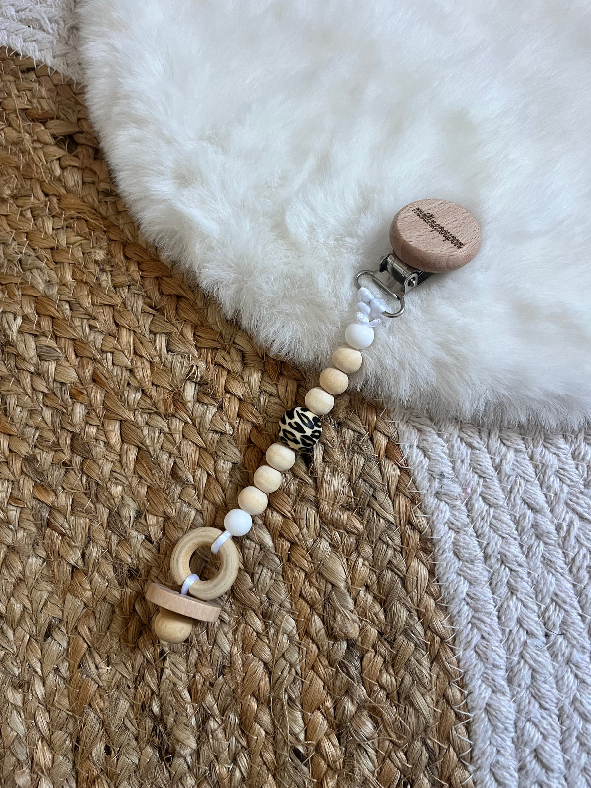 Attache tétine poupée