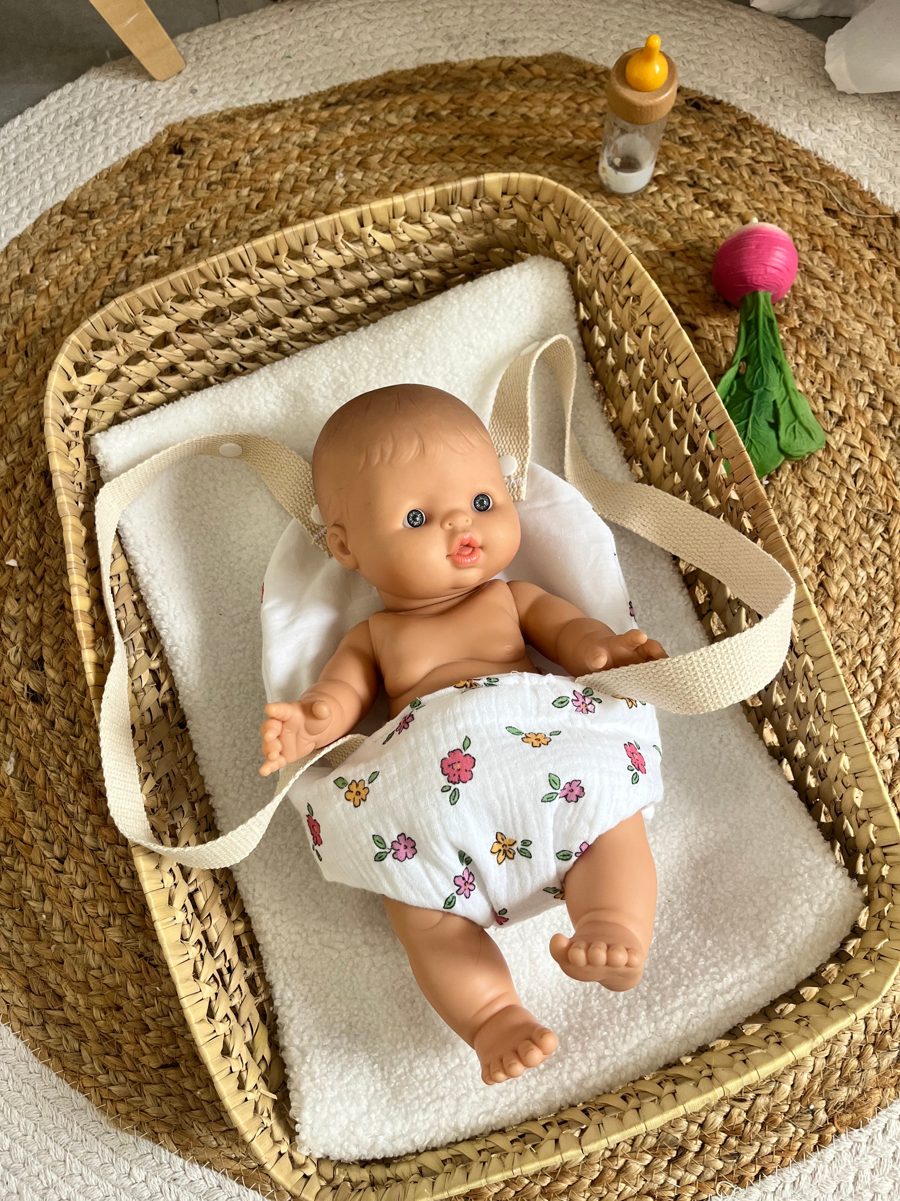 Porte bébé /poupée fleur
