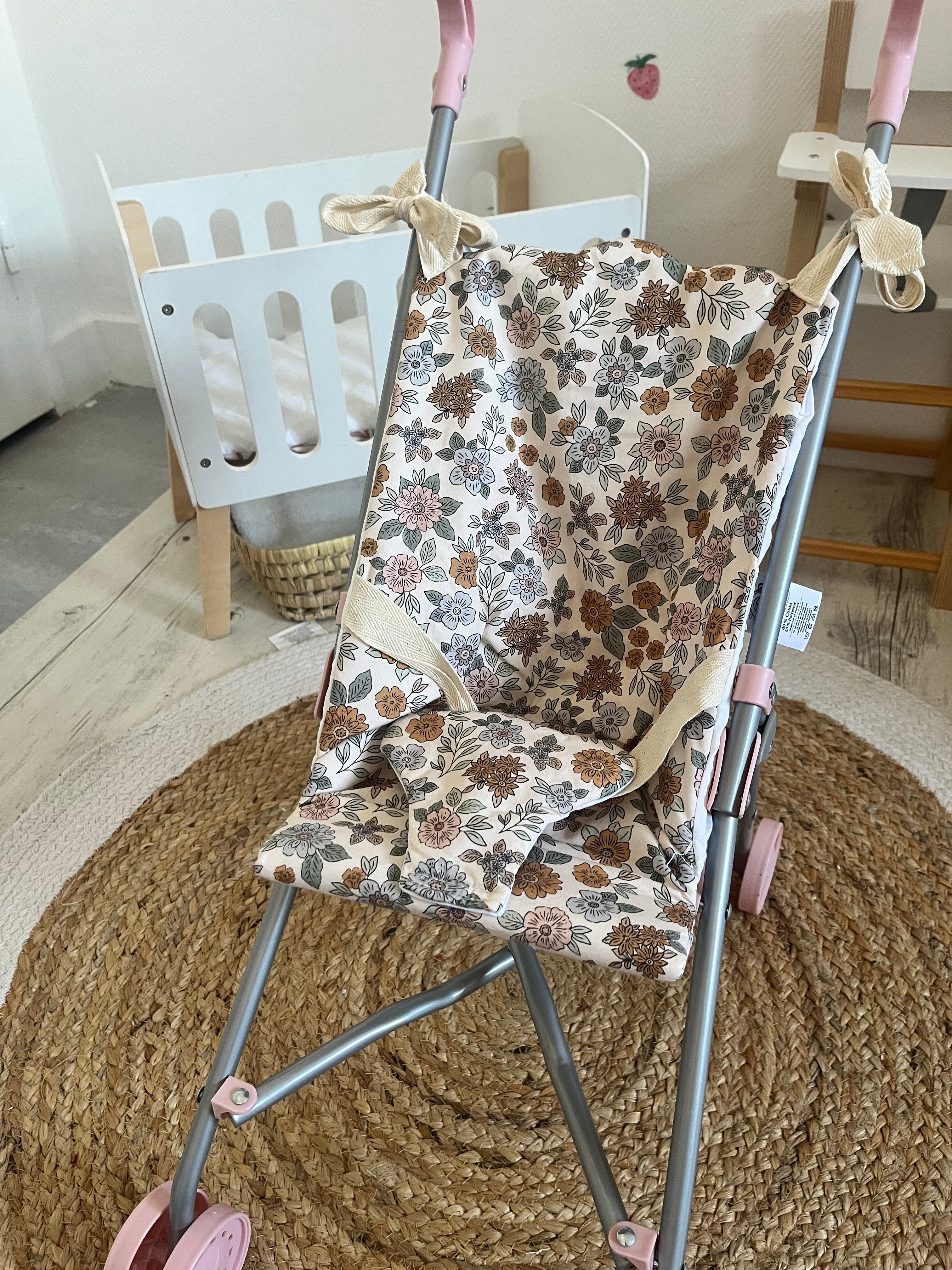 Housse poussette fleuri