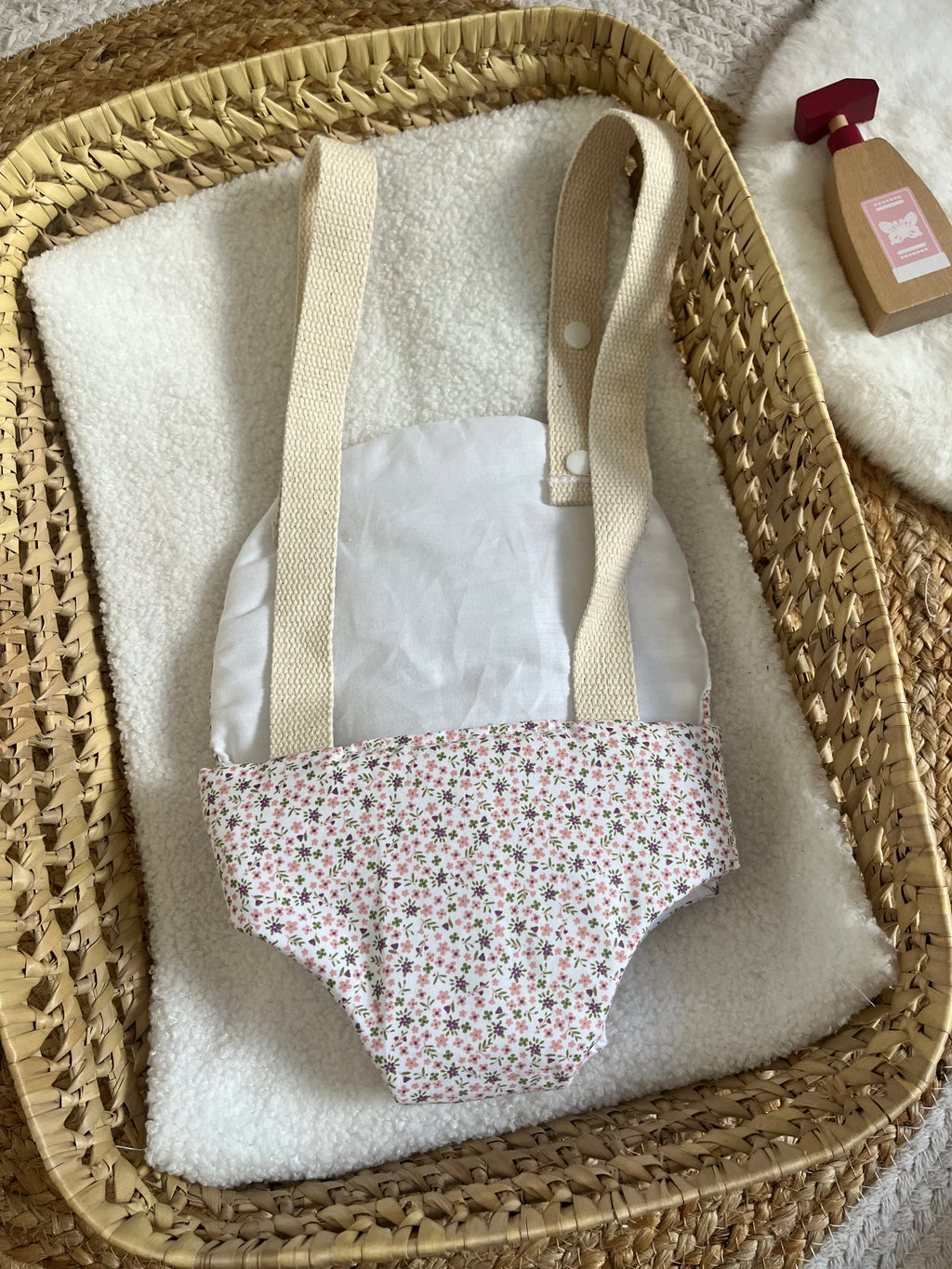 Porte bébé /poupée fleur