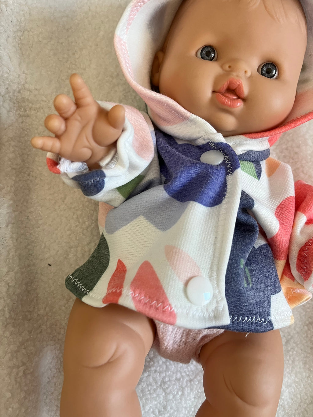 Manteau poupée fleur