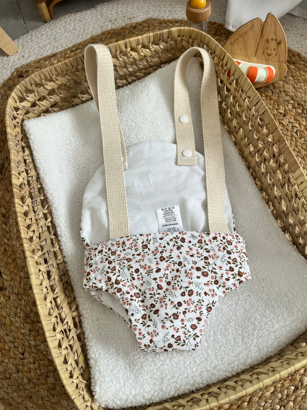 Porte bébé /poupée fleur