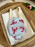 Porte bébé /poupée homard