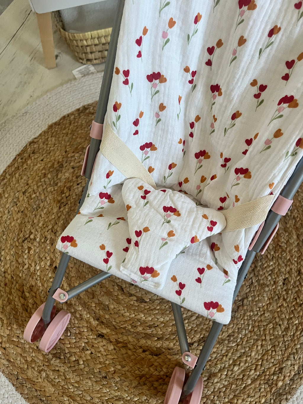 Housse poussette fleuri