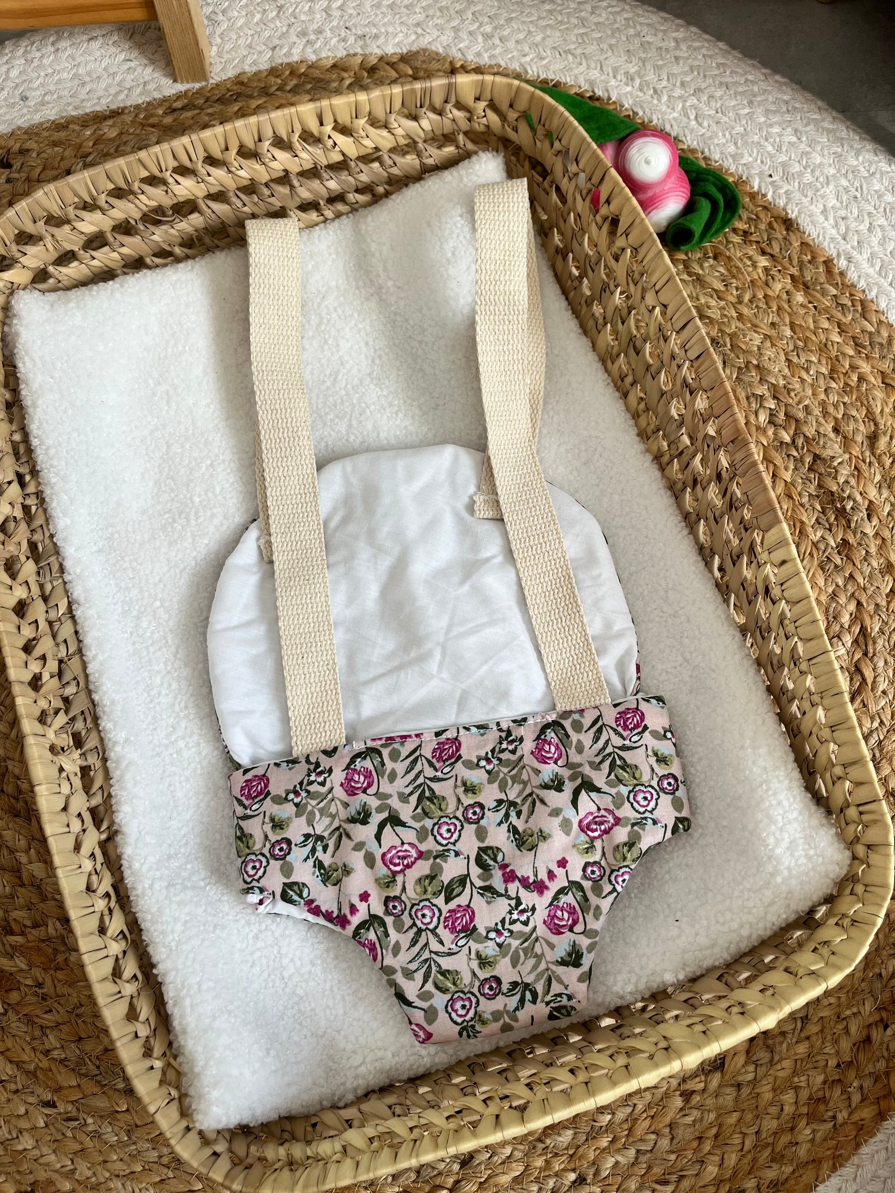 Porte bébé /poupée fleur