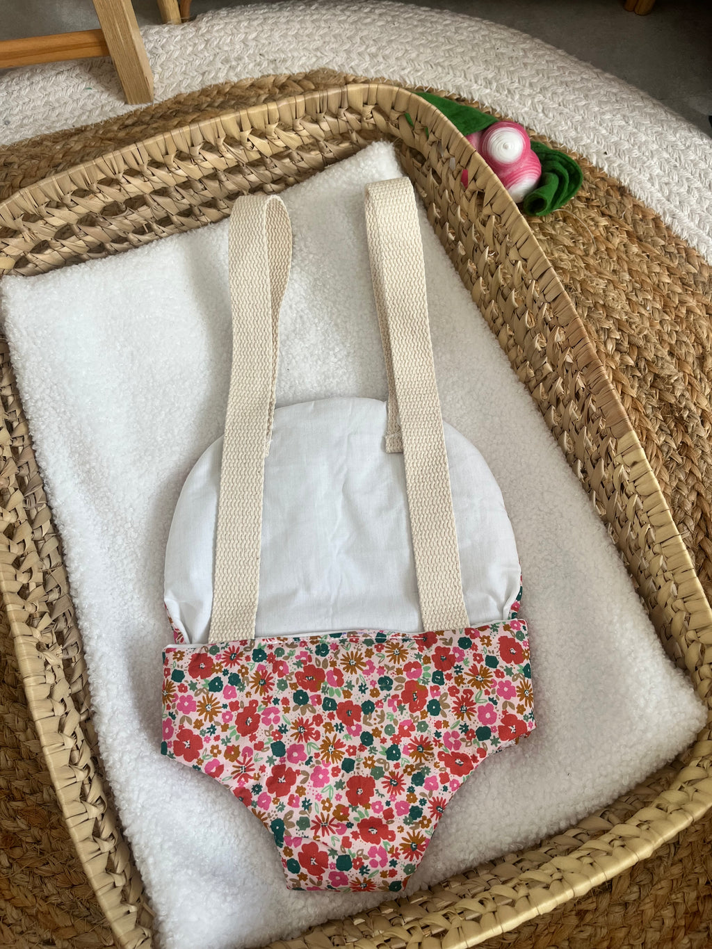 Porte bébé /poupée fleur
