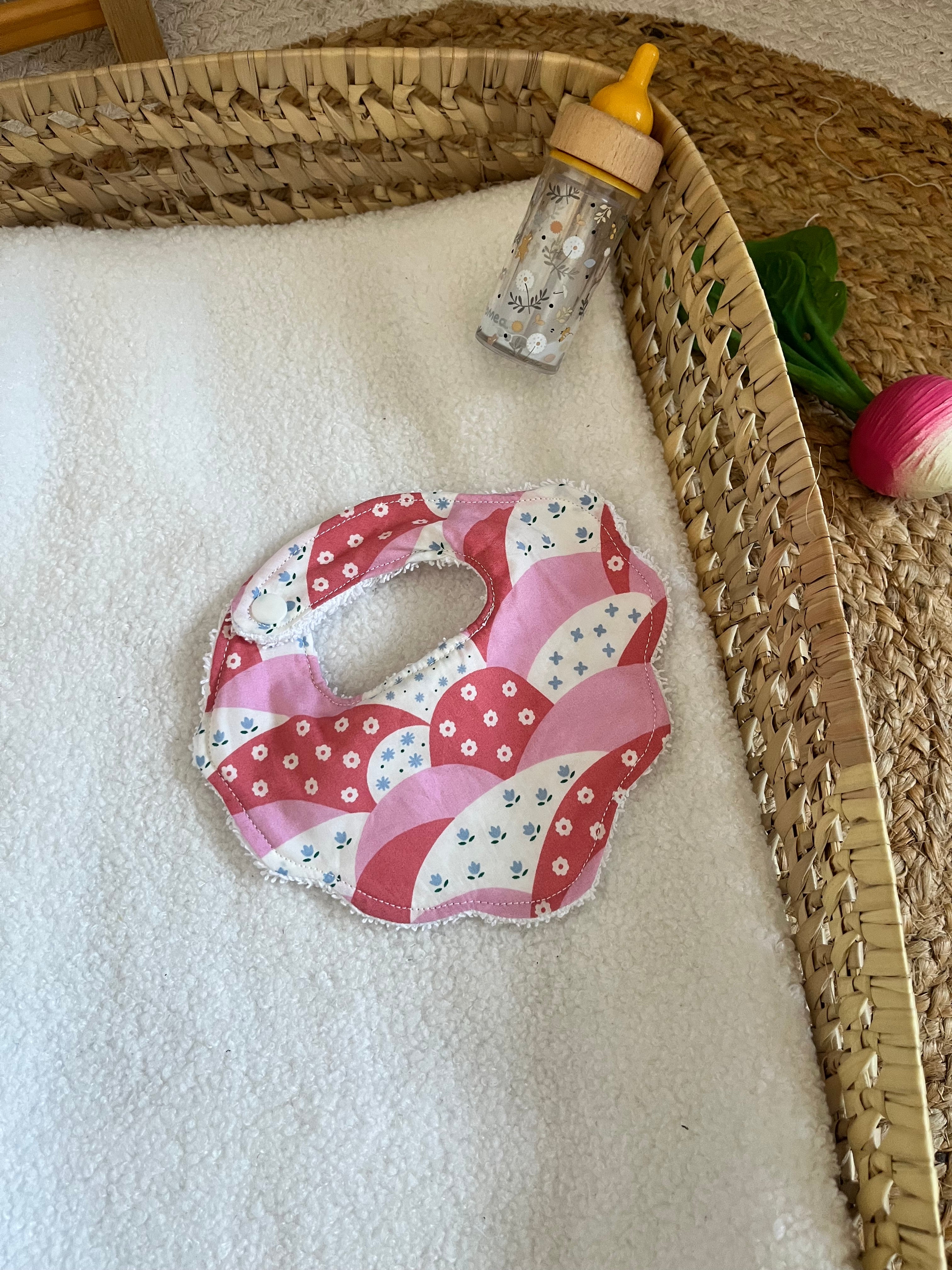 Bavoir poupée rose