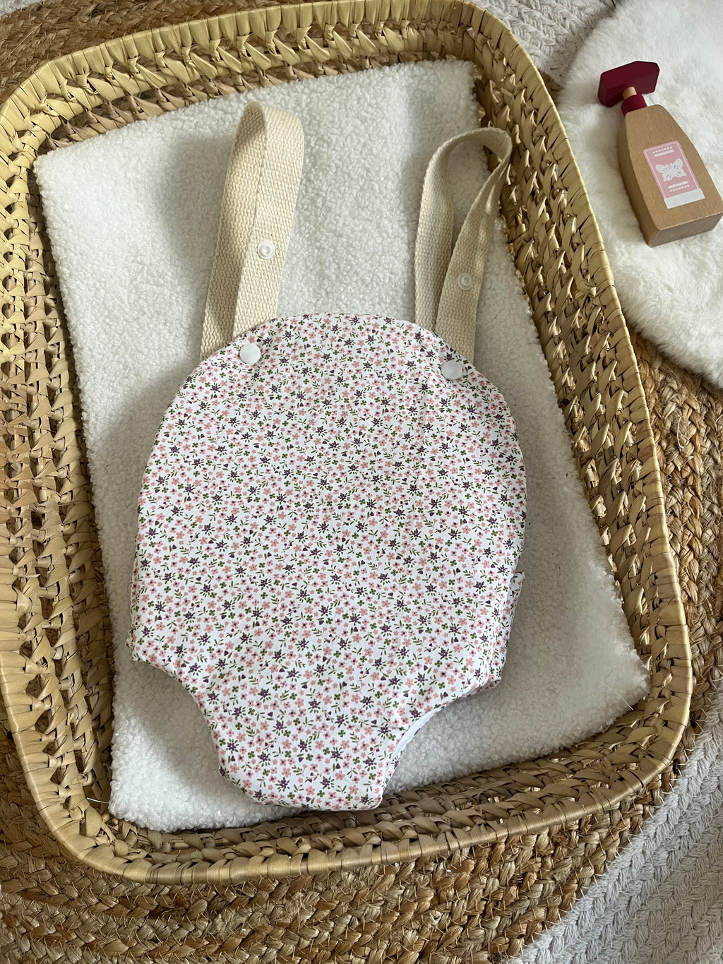 Porte bébé /poupée fleur