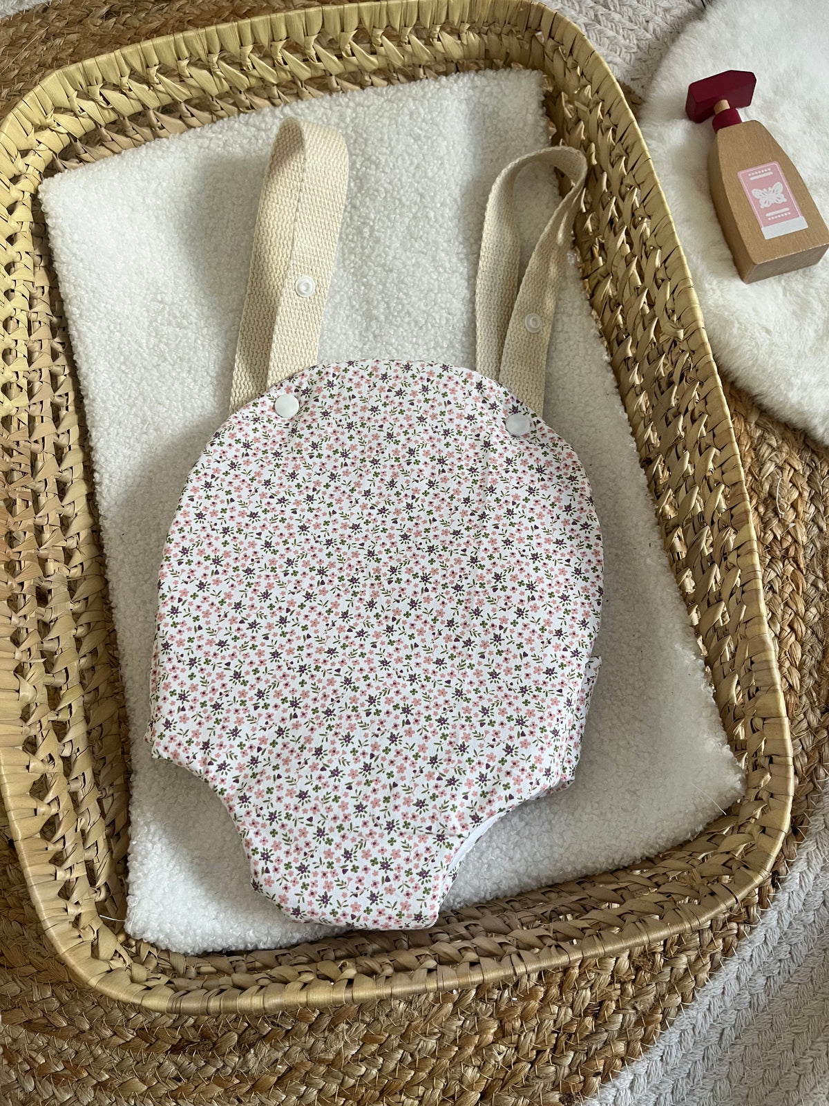Porte bébé /poupée fleur