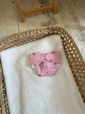 Couche fleurie rose