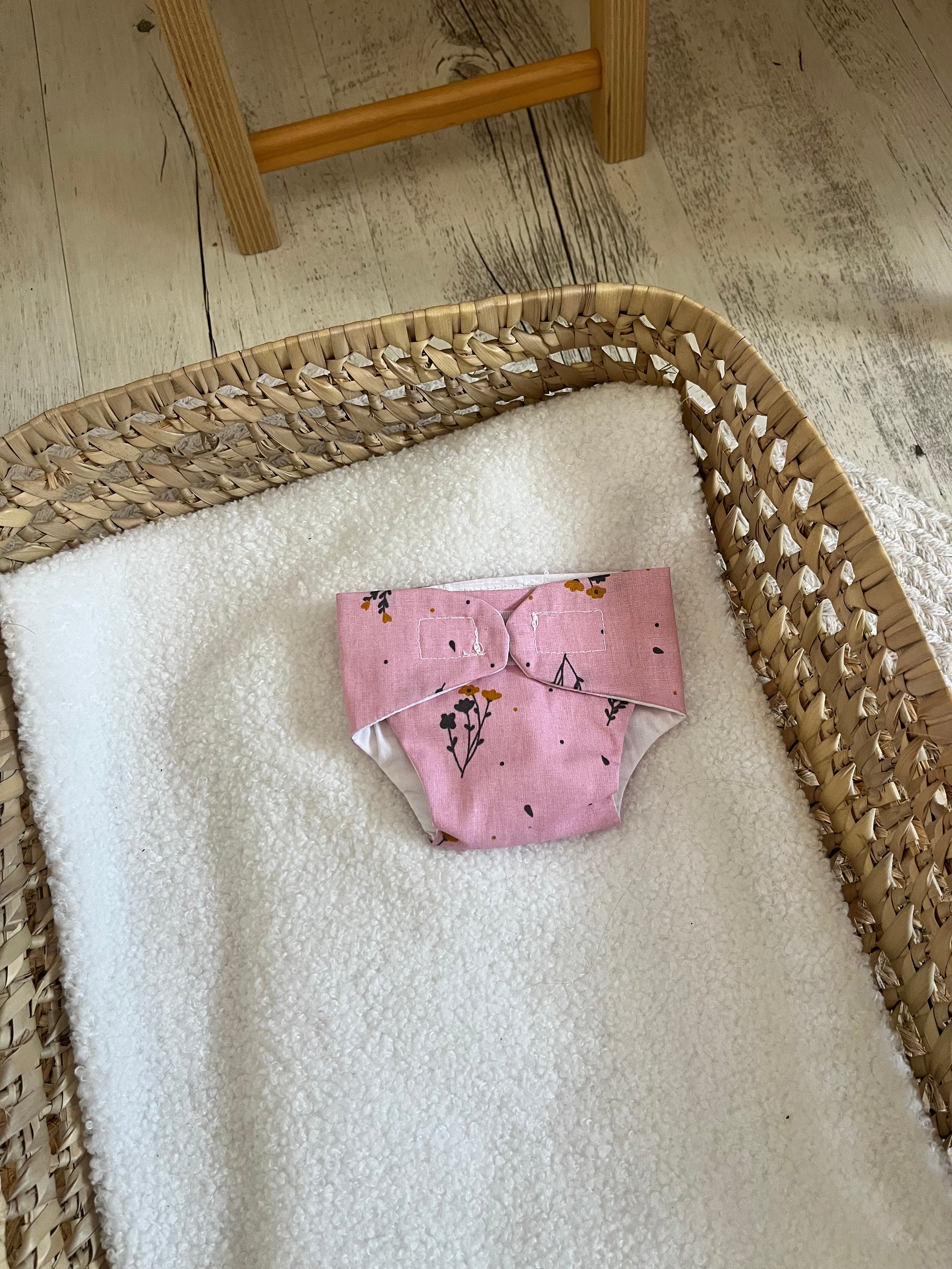Couche fleurie rose