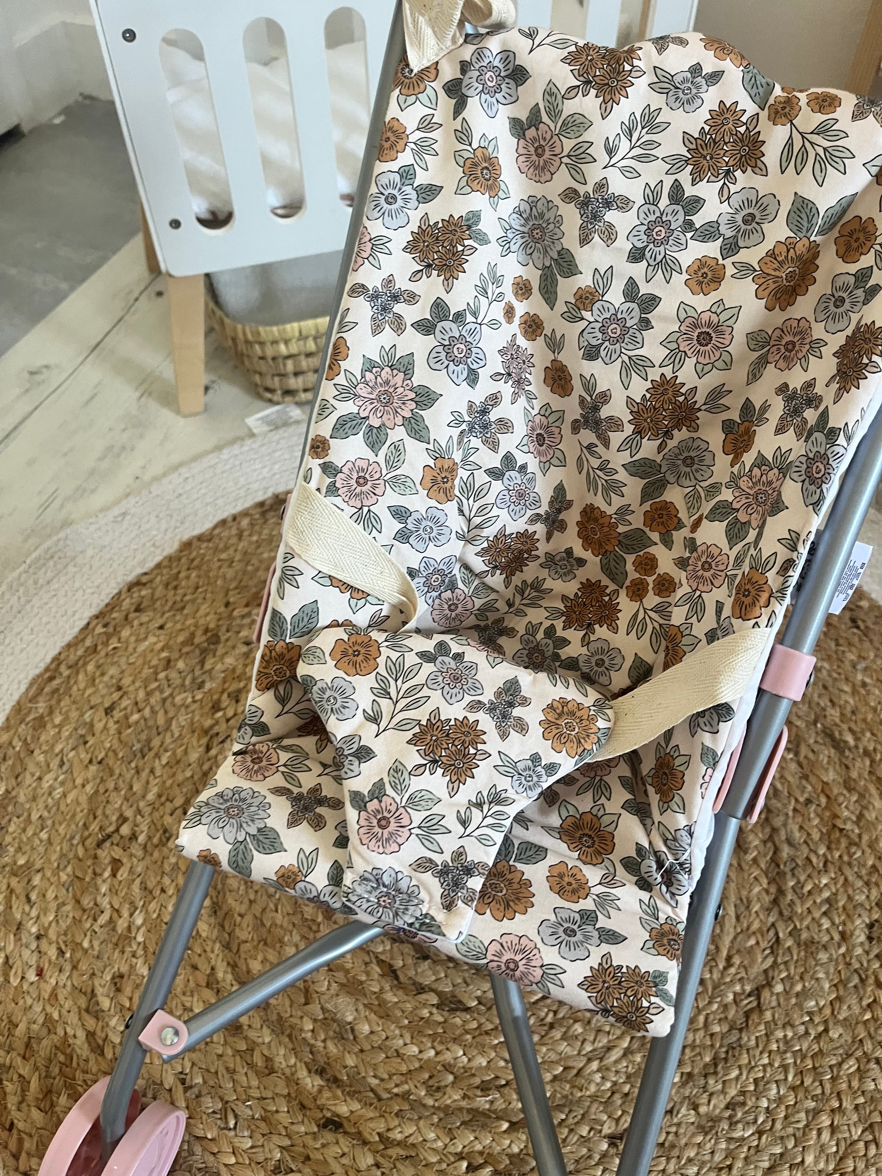Housse poussette fleuri