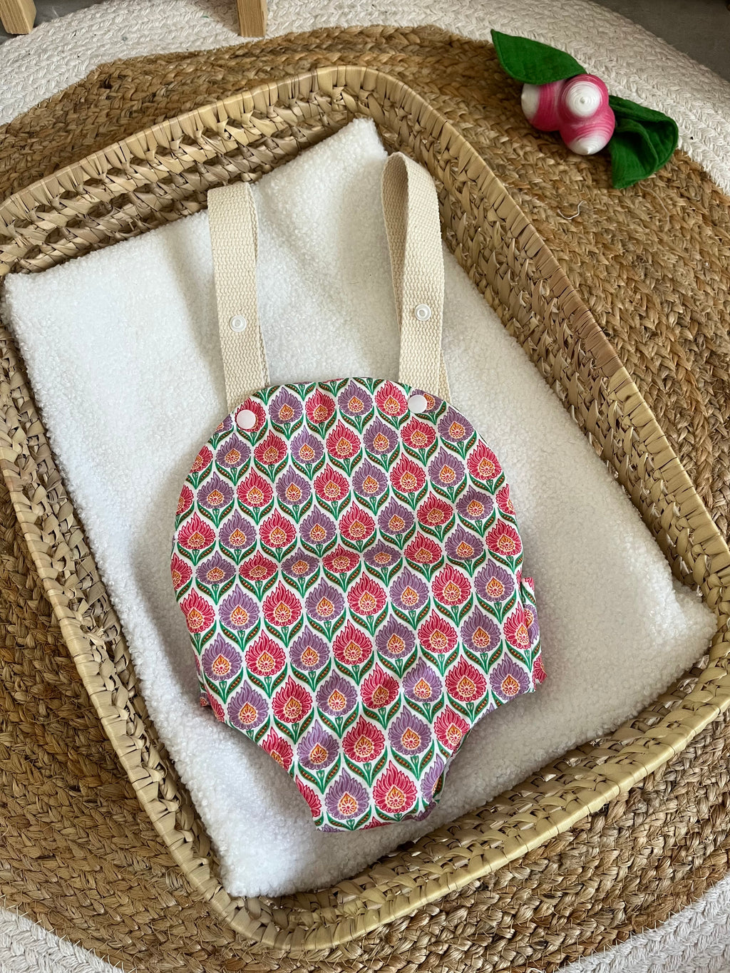 Porte bébé /poupée fleur