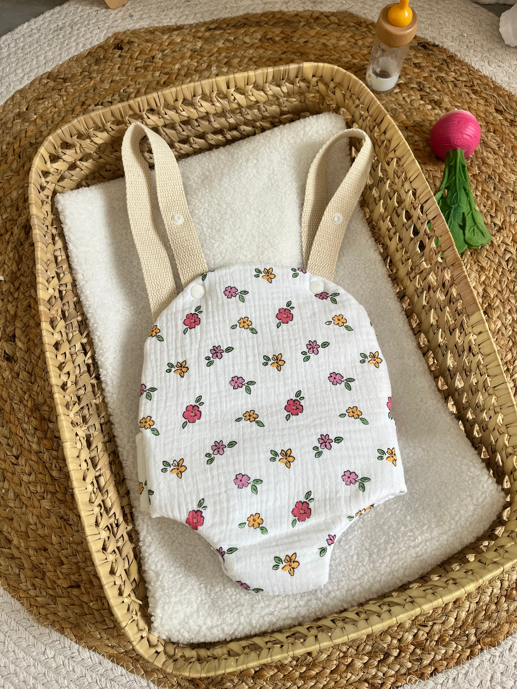 Porte bébé /poupée fleur
