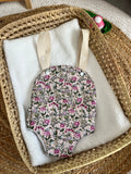 Porte bébé /poupée fleur
