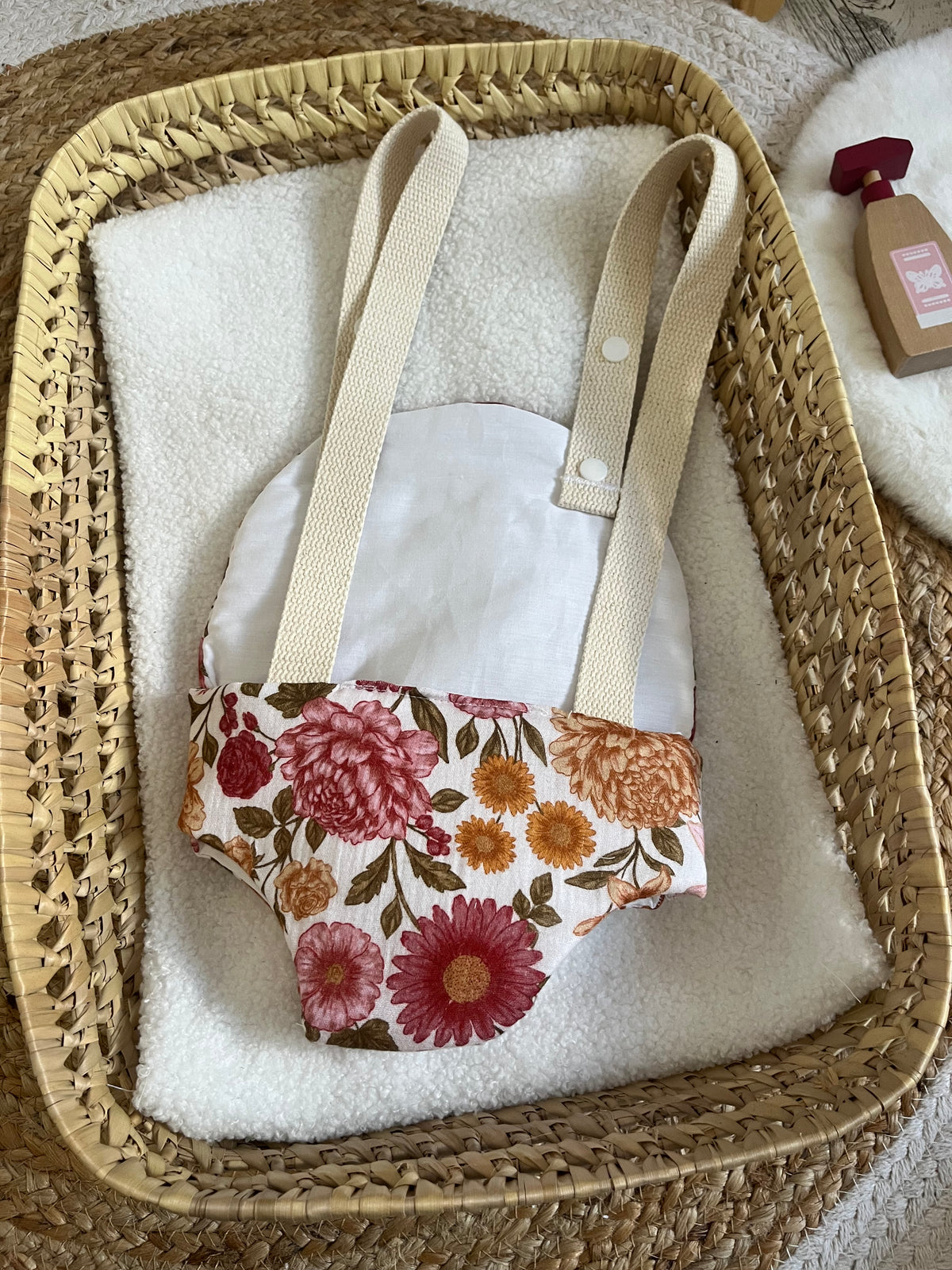 Porte bébé /poupée fleur