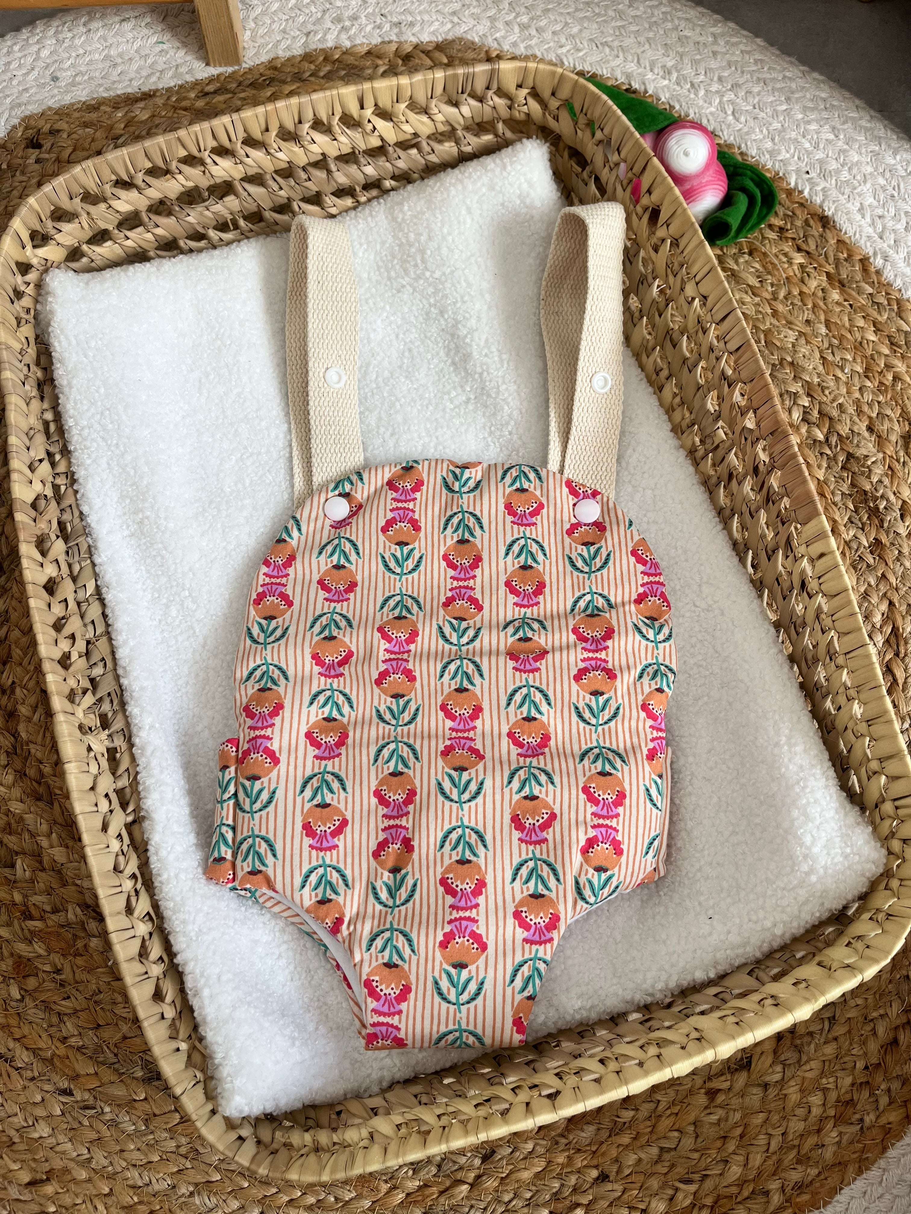 Porte bébé /poupée orange