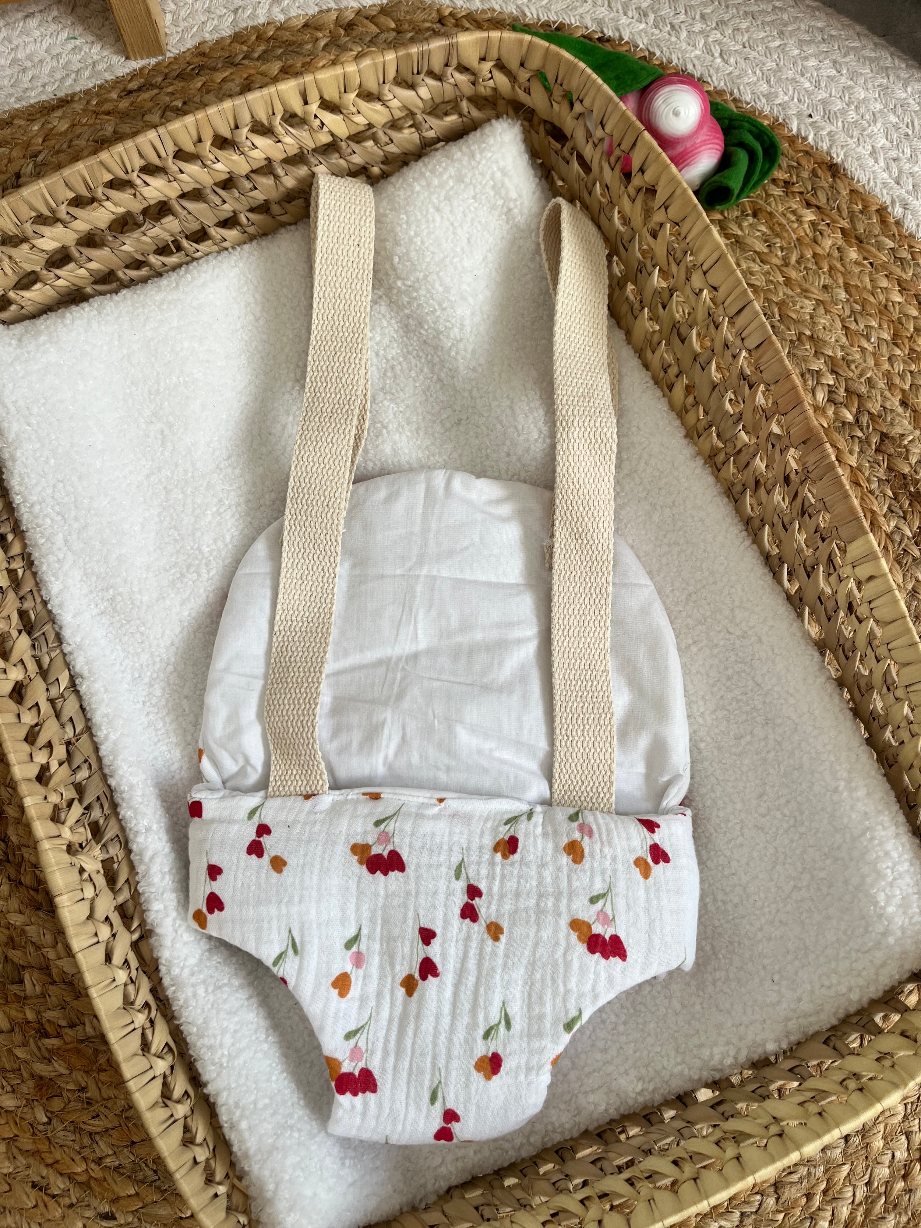 Porte bébé /poupée fleur
