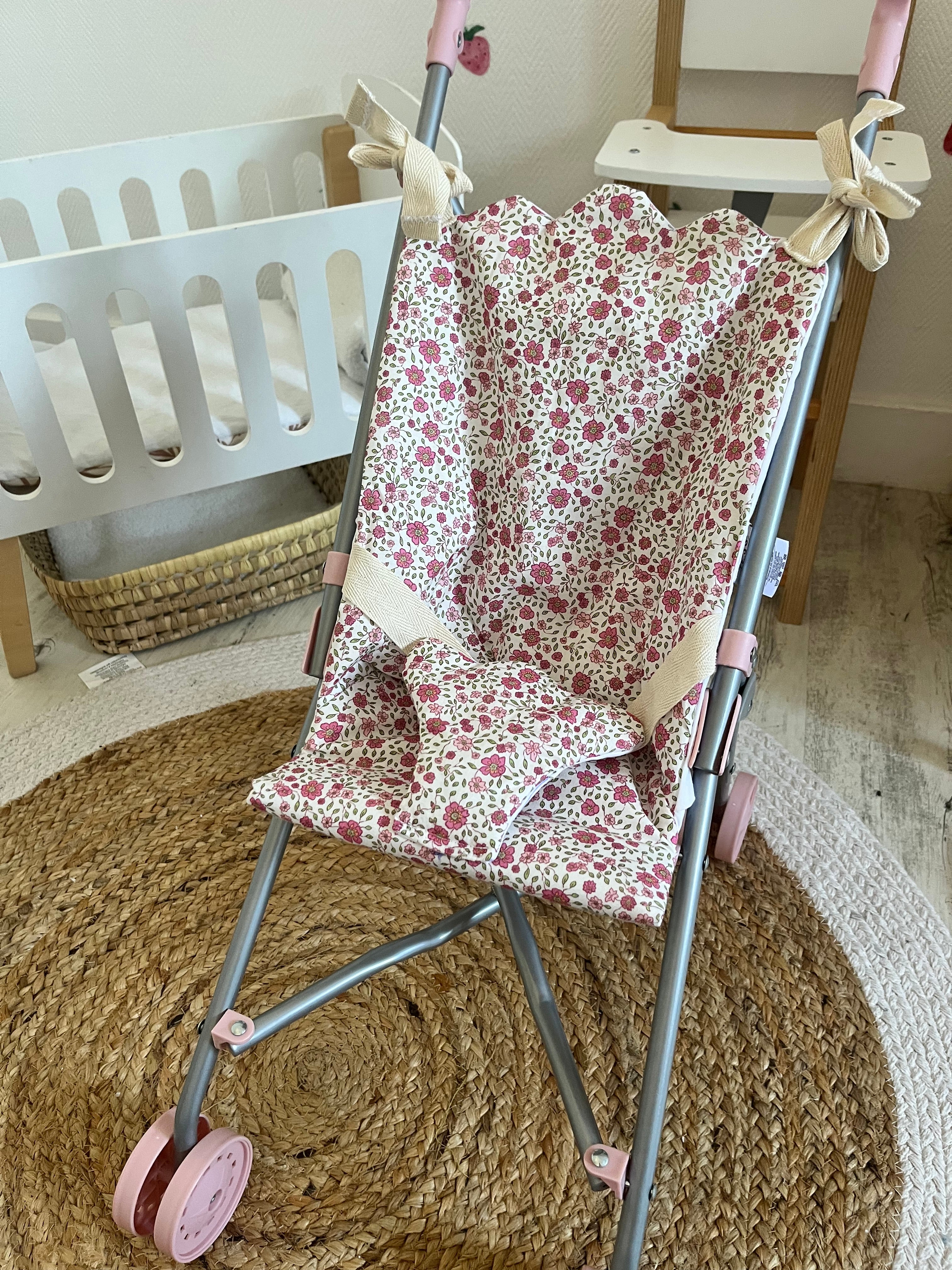 Housse poussette fleuri