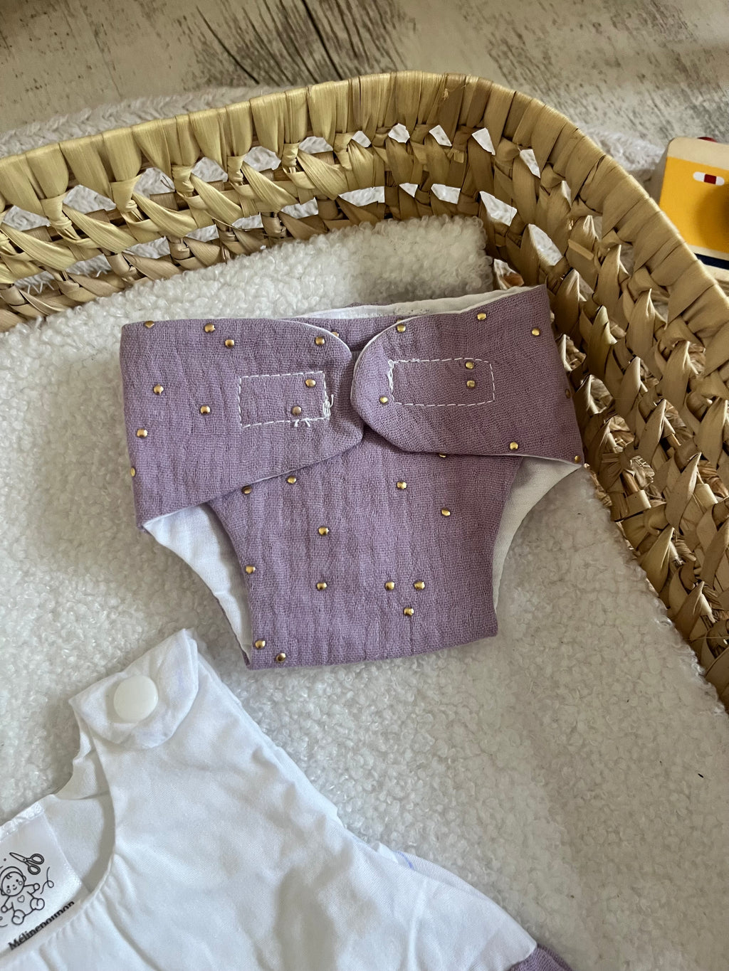 Gigoteuse + couche violette
