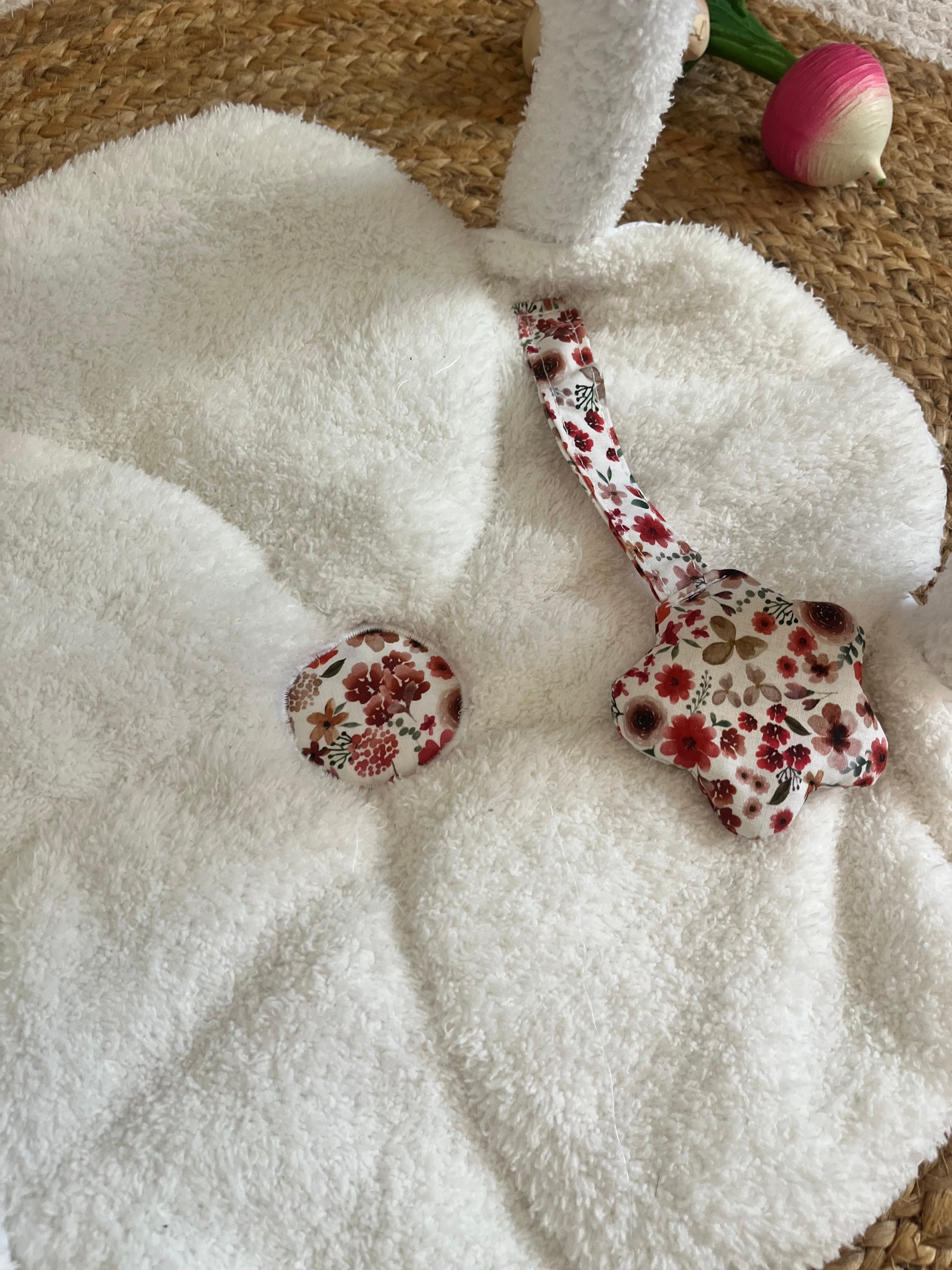 Tapis d’éveil poupée / poupon rouge