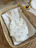 Porte bébé /poupée fleurie
