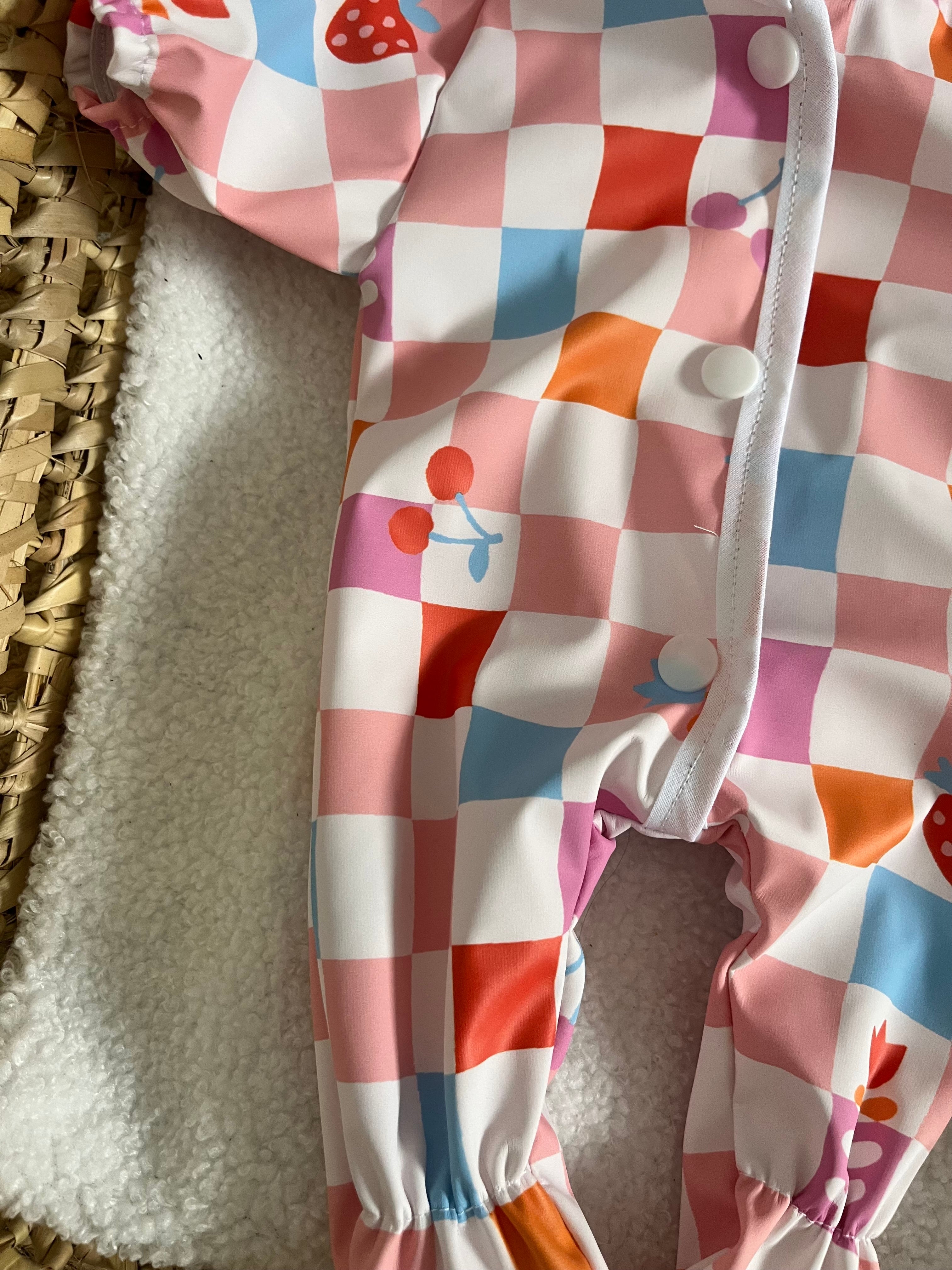Combinaison imperméable carreaux