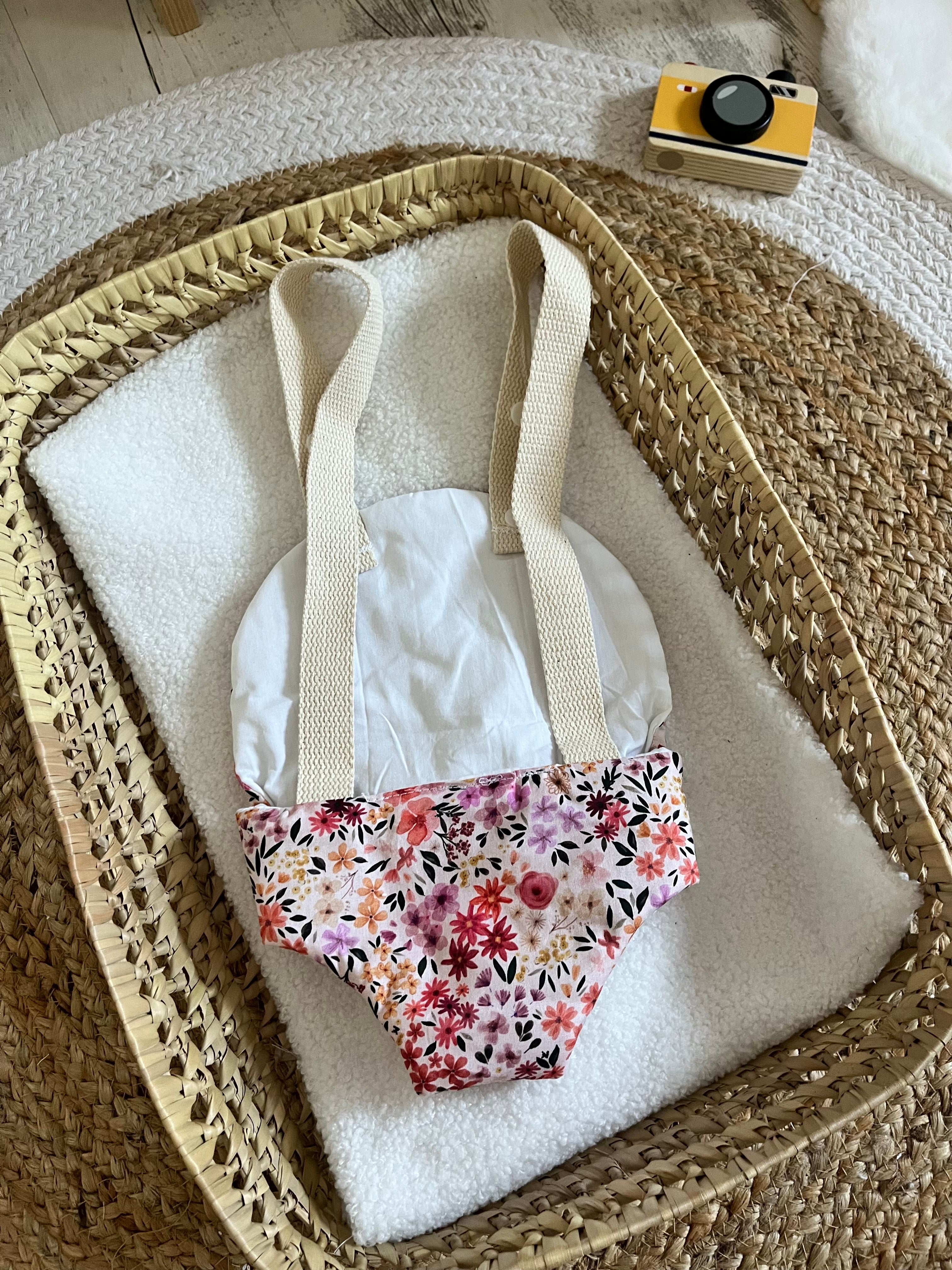 Porte bébé /poupée fleurie