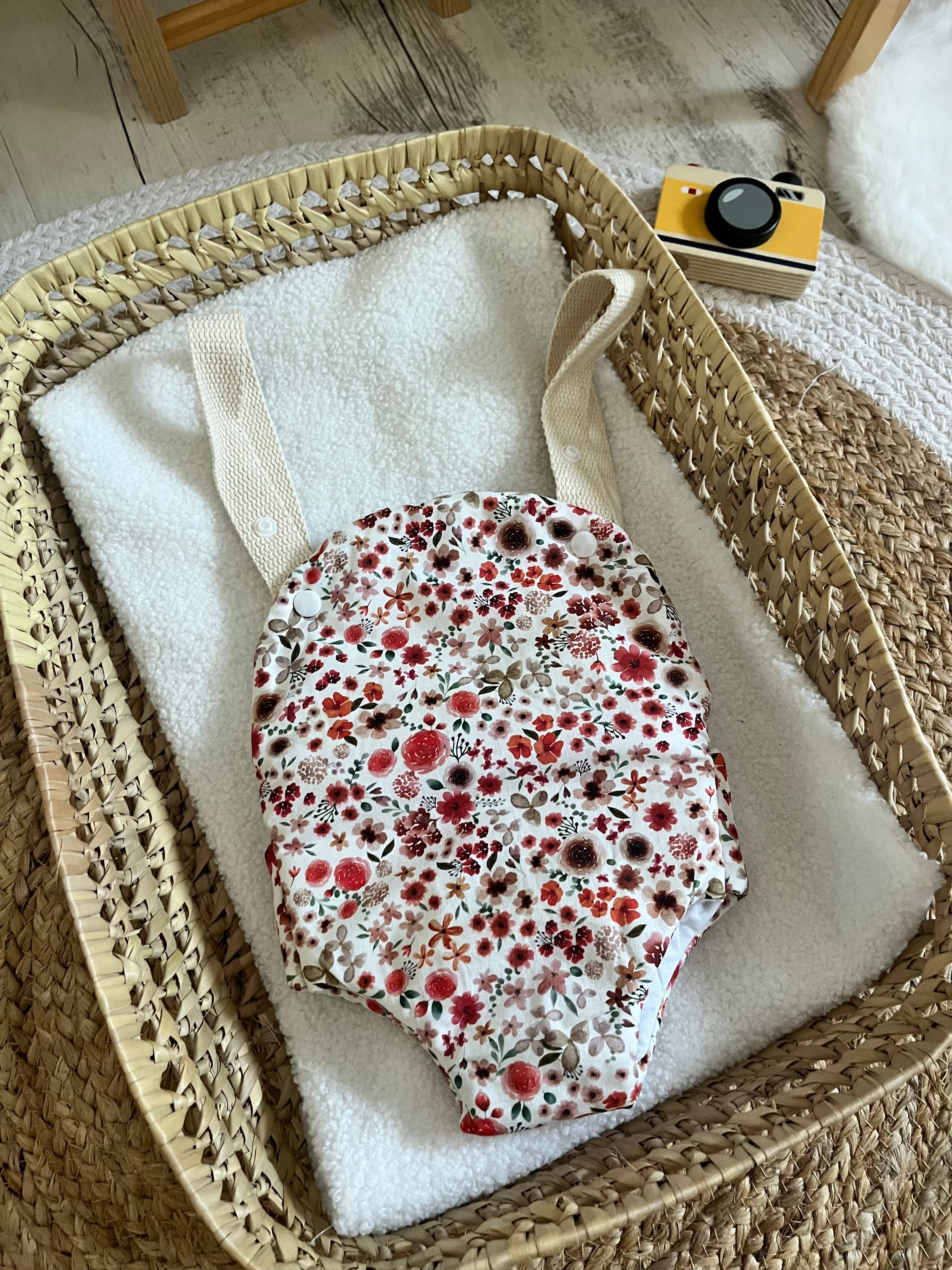 Porte bébé /poupée fleurie