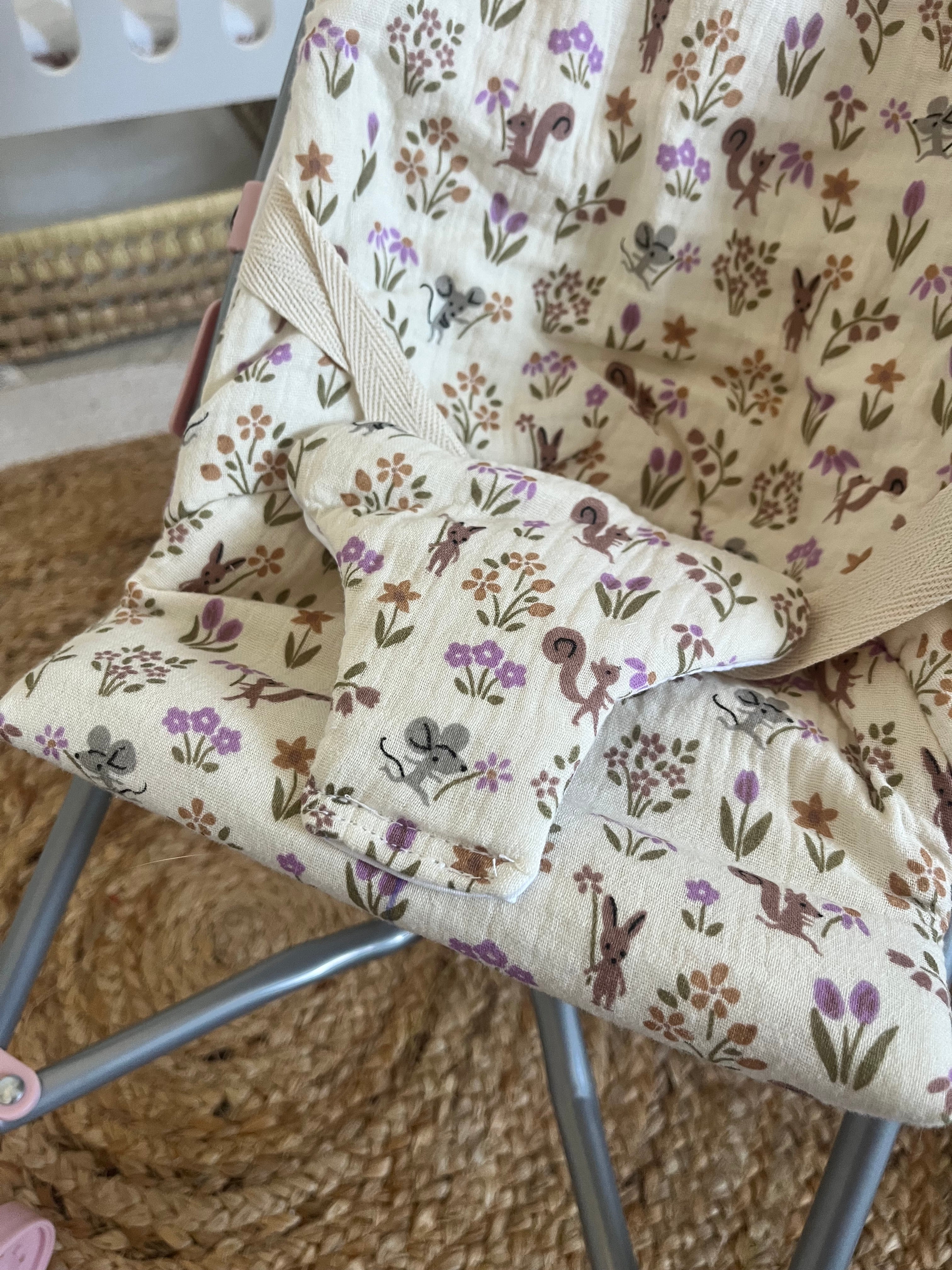 Housse poussette violette
