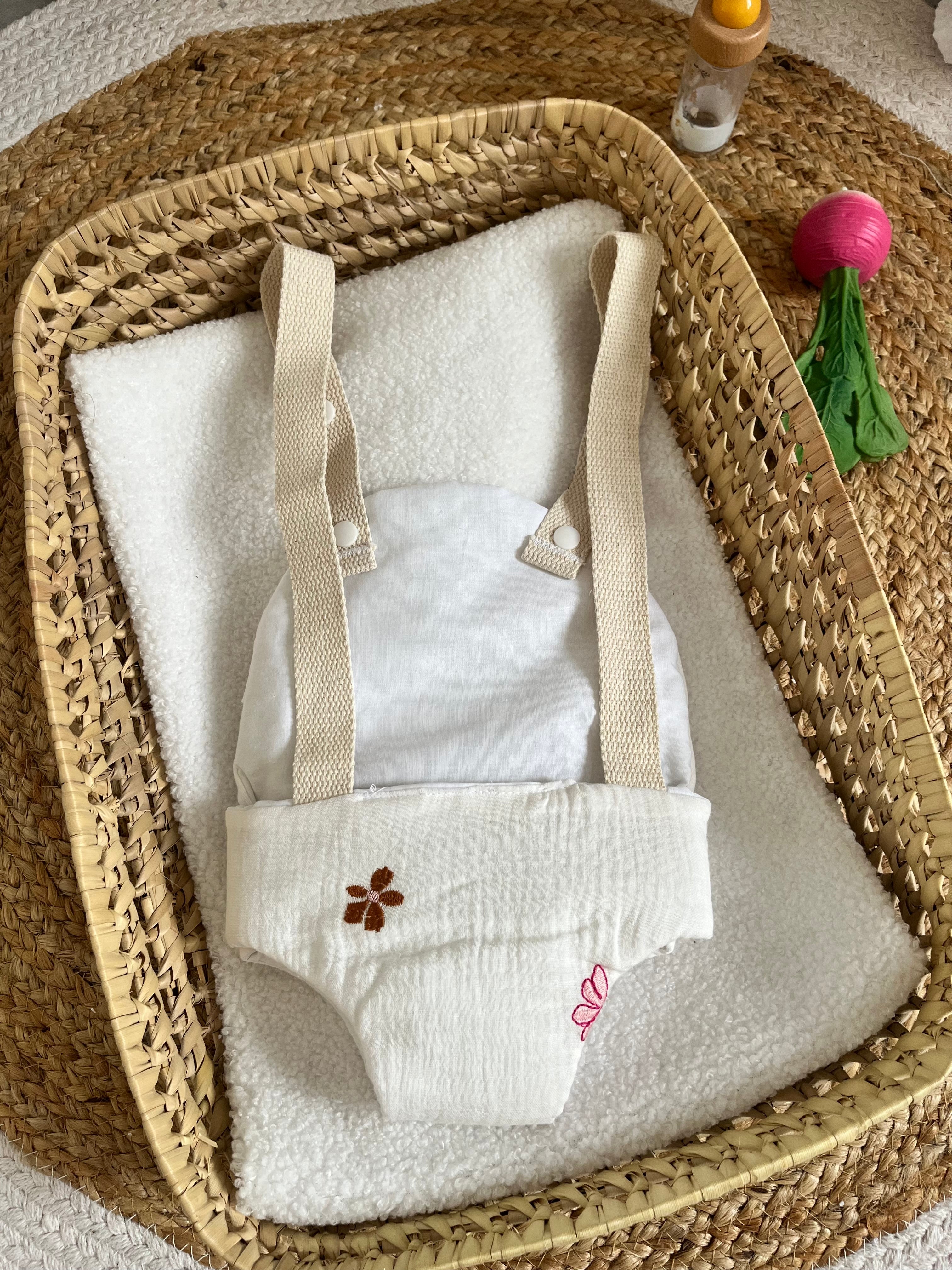 Porte bébé /poupée fleur