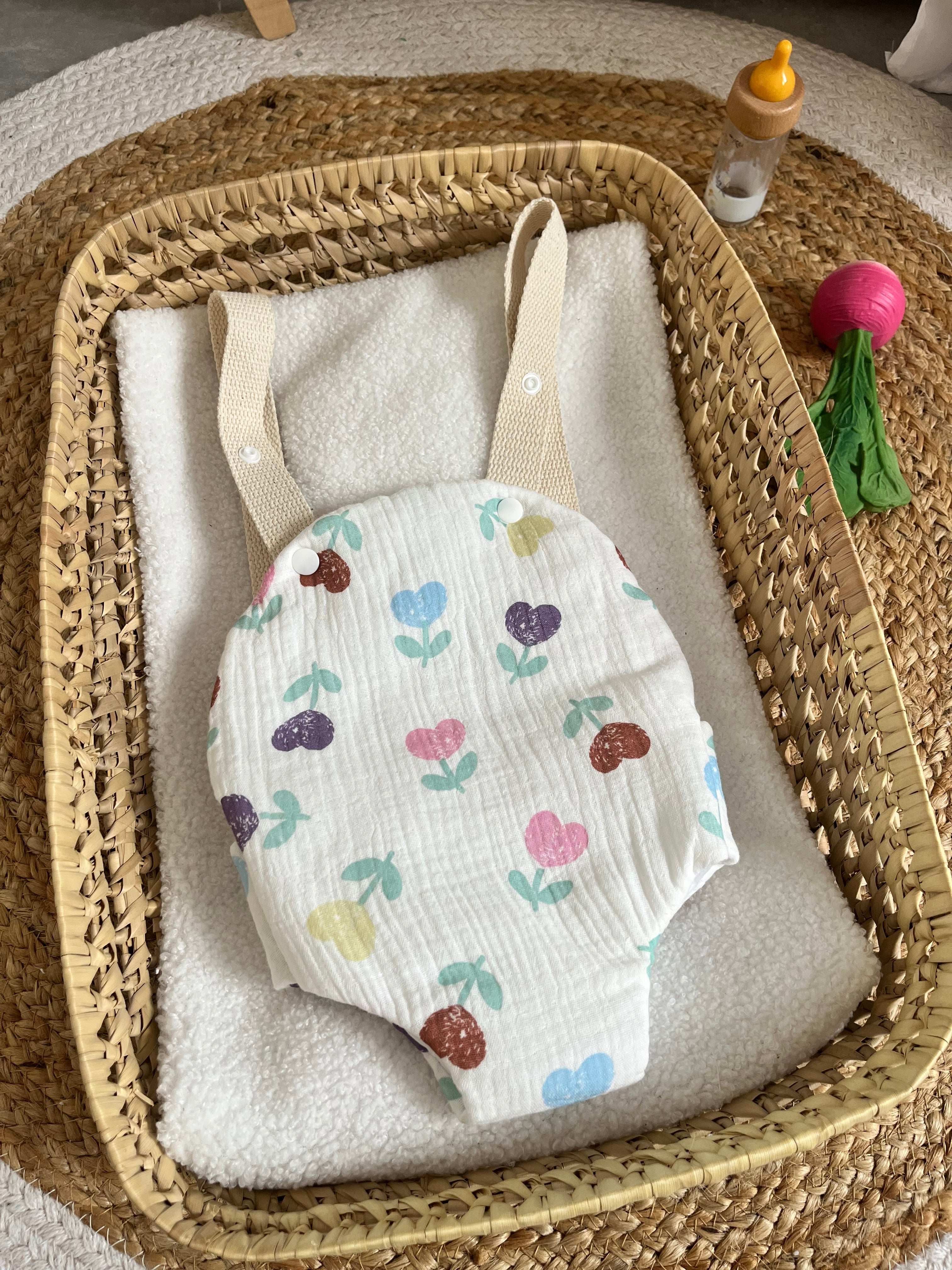 Porte bébé /poupée cœur fleur