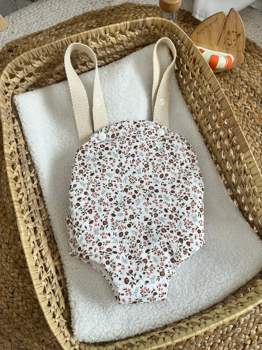 Porte bébé /poupée fleur