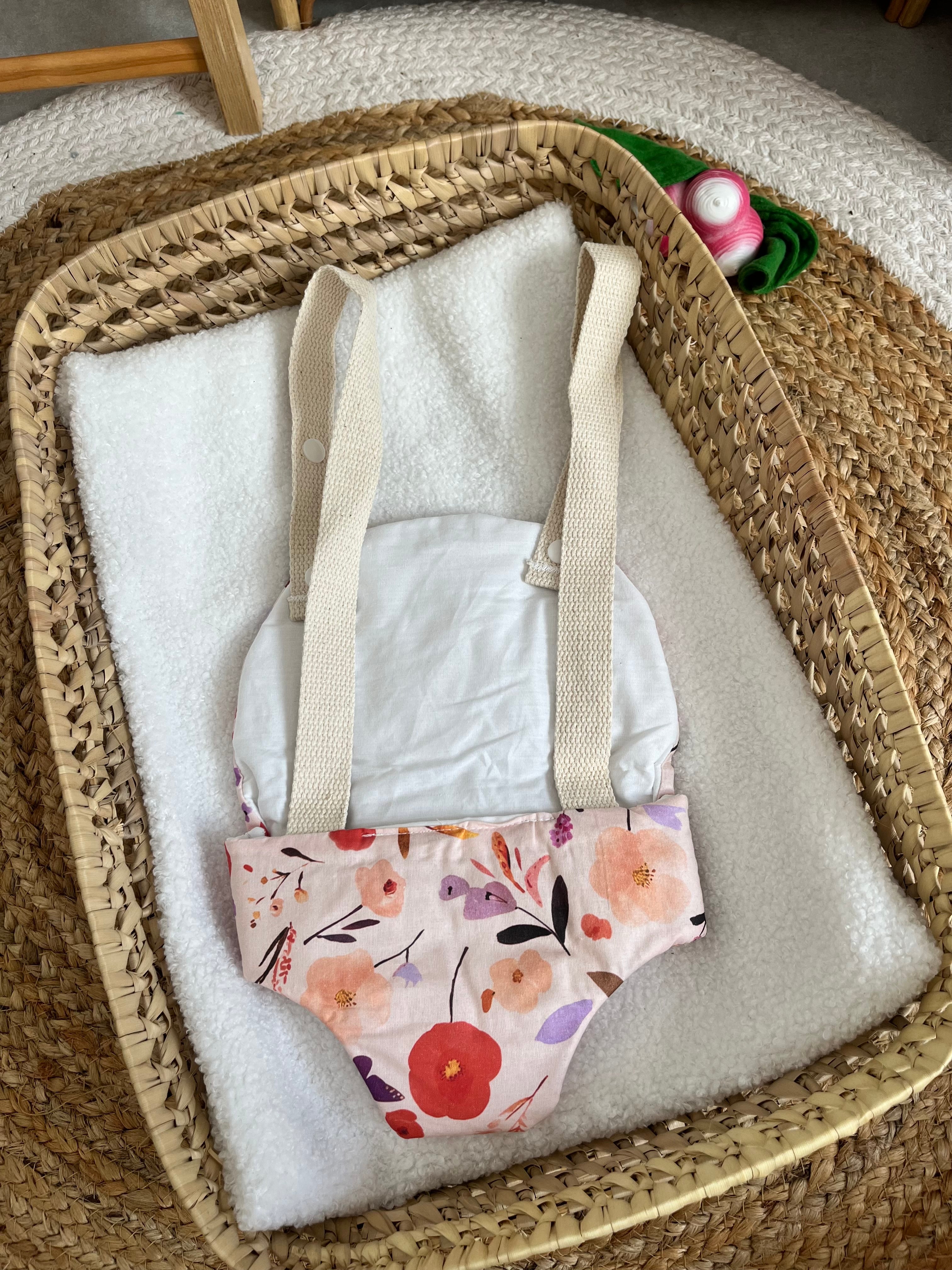 Porte bébé /poupée fleur