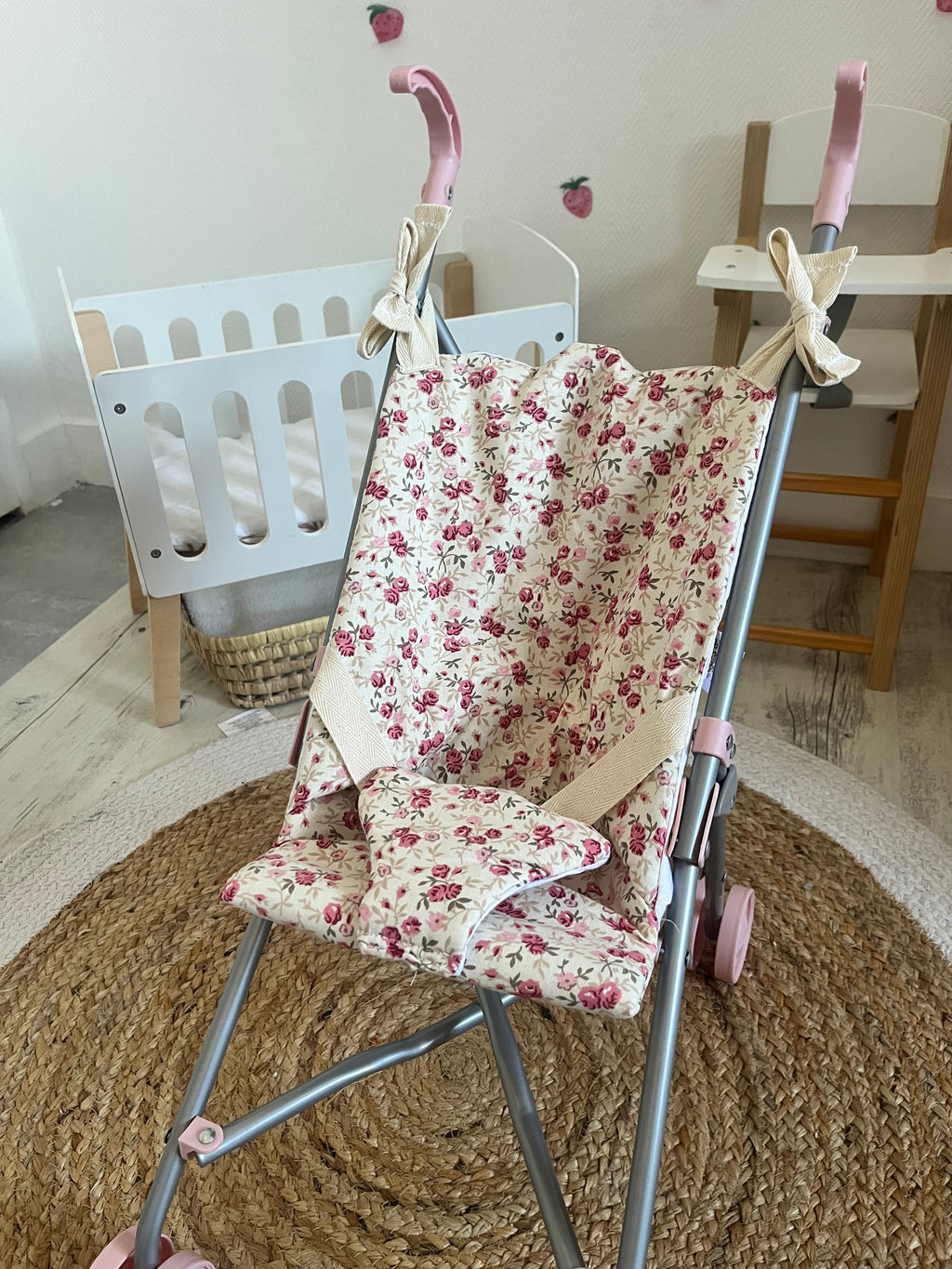 Housse poussette fleuri