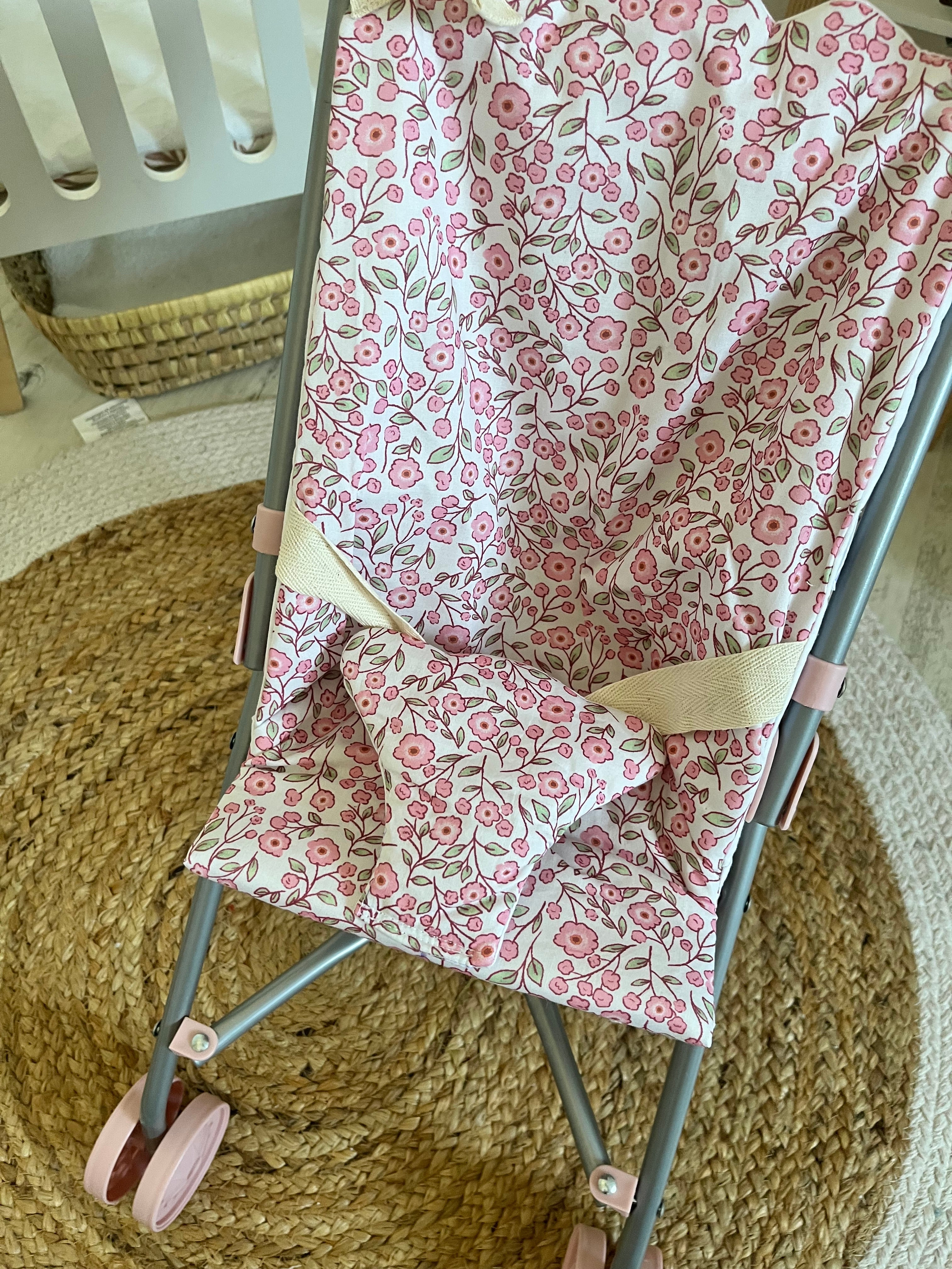 Housse poussette fleuri