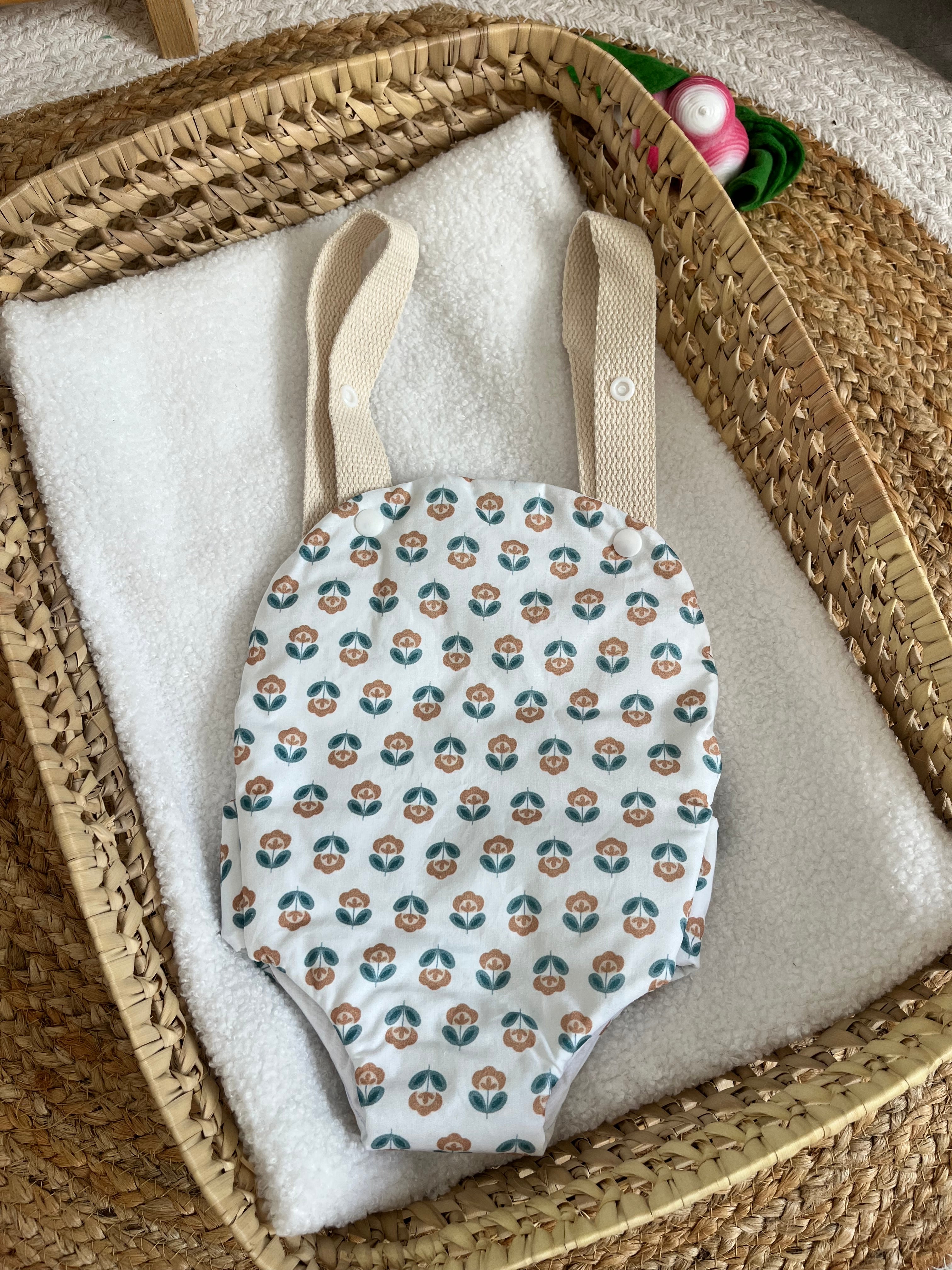 Porte bébé /poupée fleur