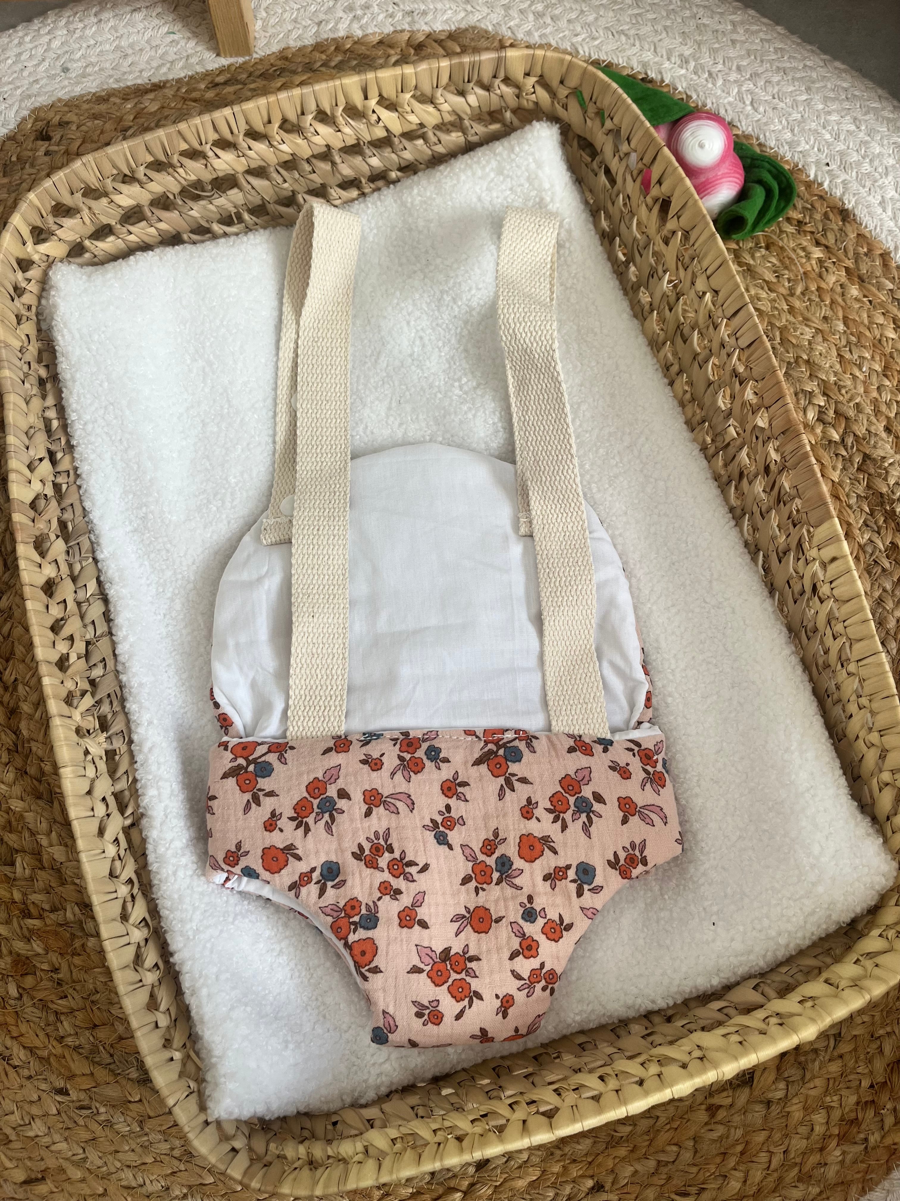 Porte bébé /poupée rose