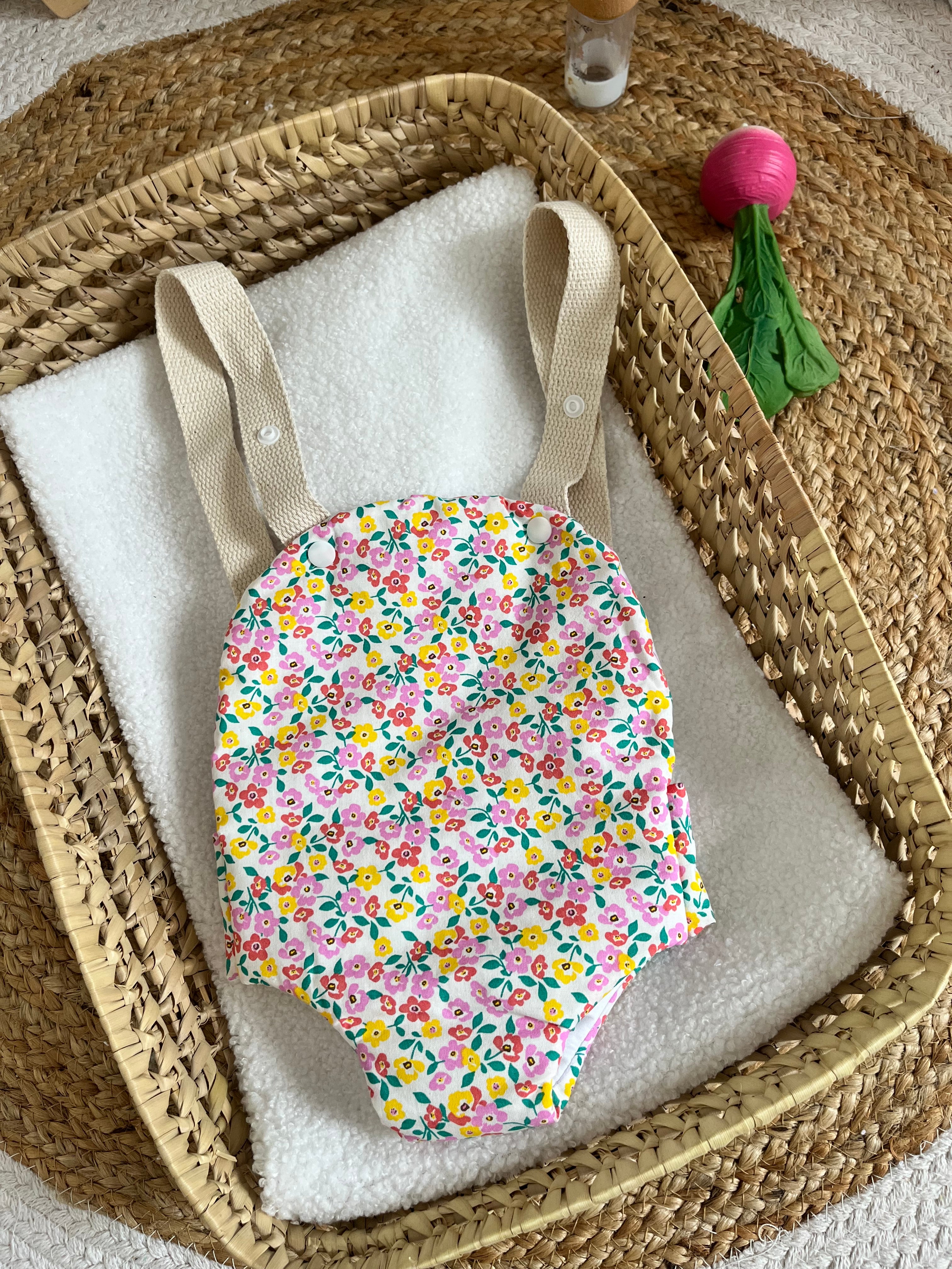 Porte bébé /poupée fleur