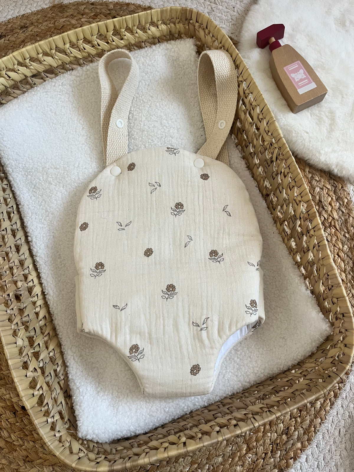 Porte bébé /poupée fleur