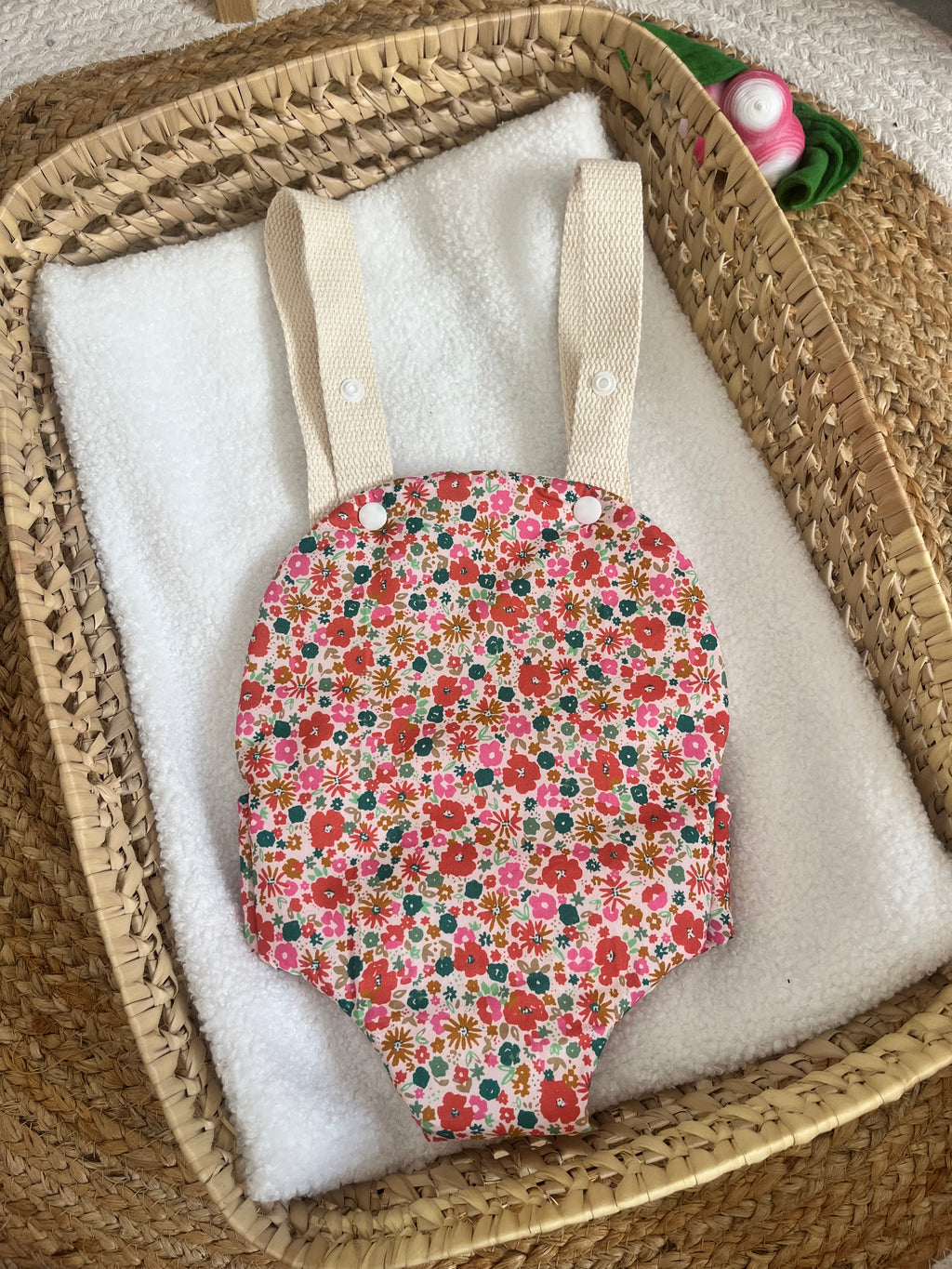 Porte bébé /poupée fleur
