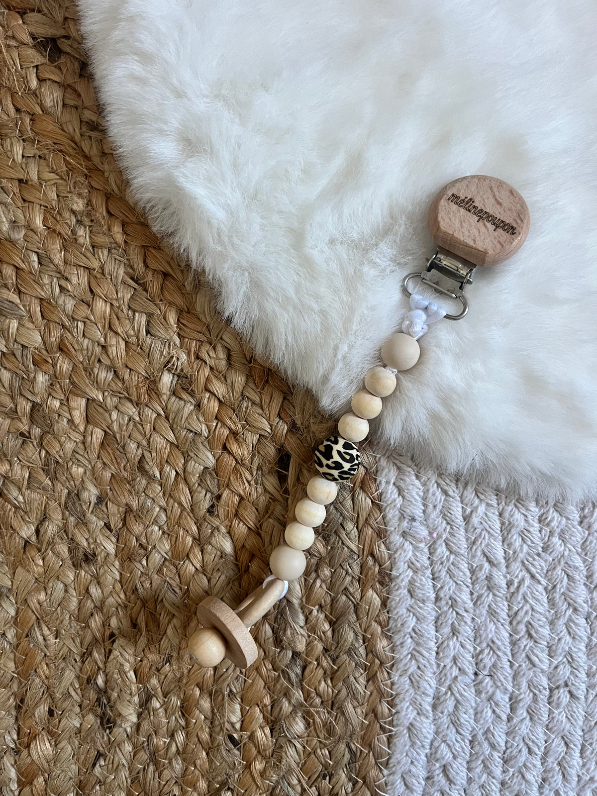 Attache tétine poupée